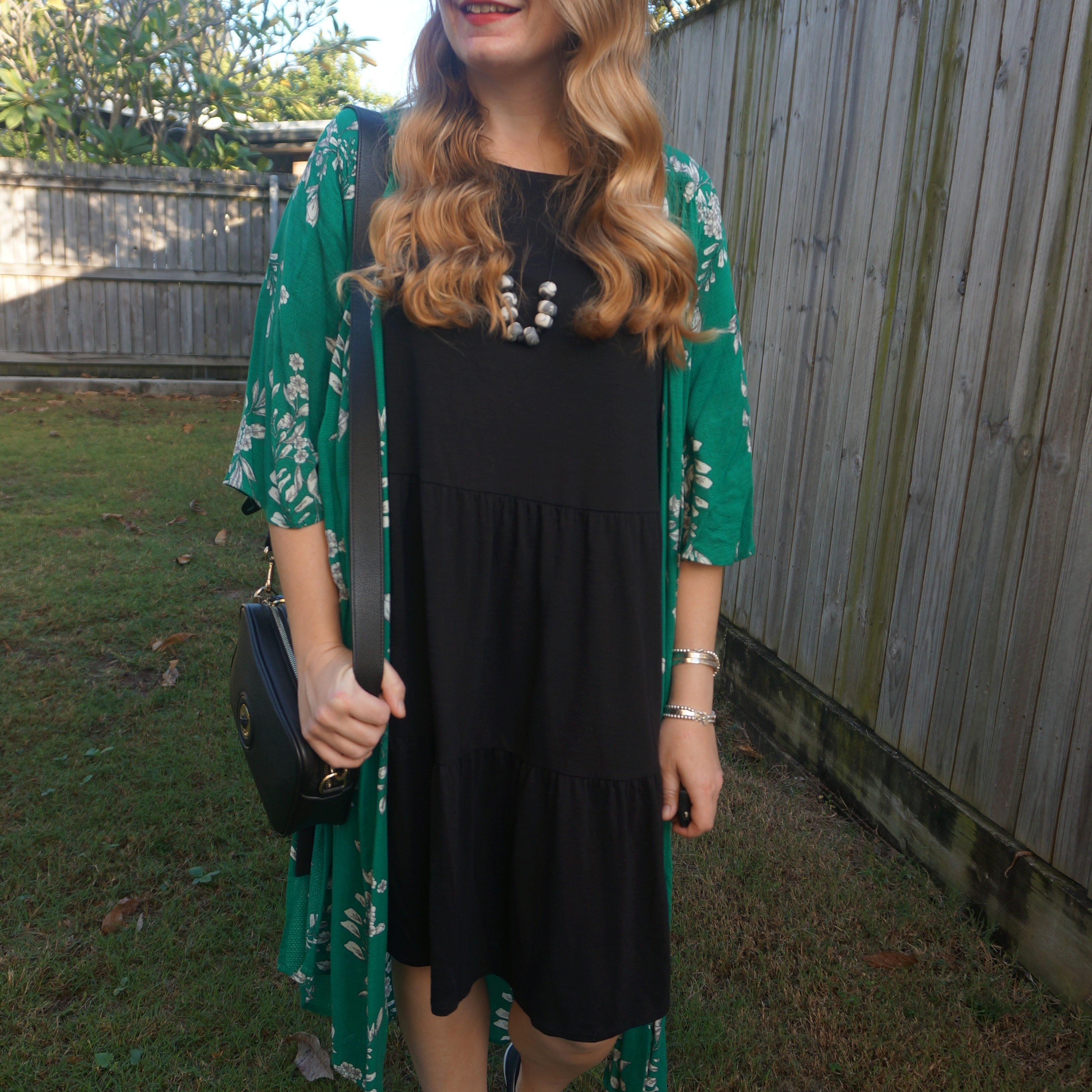 Jeanswest green floral cover up with thrifted Kmart Anko tiered little black dress and Mimco Mim-mazing crossbody bag 🖤💚

#LTKautumn #LTKdresses #LTKbag
