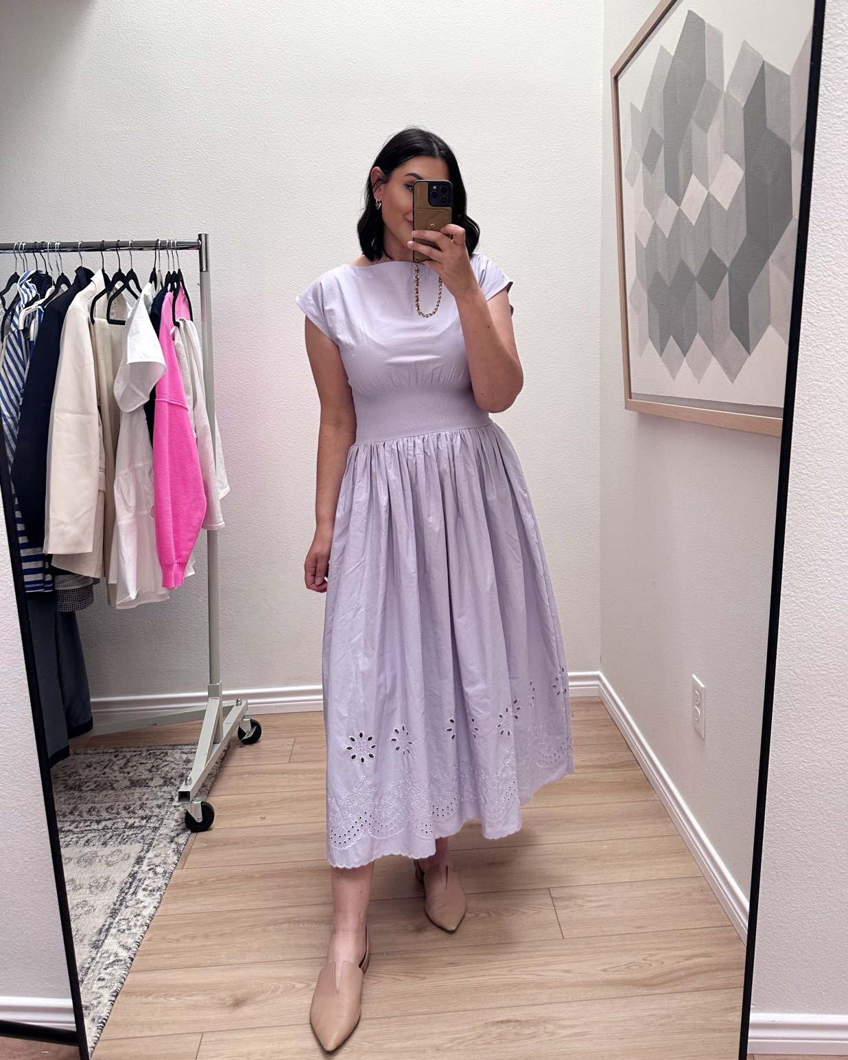 I absolutely adore this dress! It's currently on sale for 40% off! I'm wearing a medium, which fits true to size. However, since I'm about to start my period, I'm feeling a bit bloated and my bust is larger than usual, making it fit a little snugger at the chest than I prefer. This is just a temporary situation, so the medium it is for me.

It’s a TTS fit with smocking in the middle. So nice for those of us who have rounder waists, it gives a nice, hourglass silhouette!. 

 