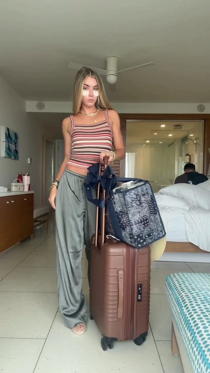 My airport outfit to travel home! My pants size xs @abercrombie  the satin wide leg pants. My tank is @Pistola Denim  the Frankie knit tank it’s a missoni look for less. My necklaces are all @electricpicks  and my favorite jelly shoes from Tory Burch.

and back to the states we go my travel outfit leaving the Bahamas 🥲 these pants are a must have travel pant they’re the best satin fabric 

#airportoutfit #traveloutfit #bahamasoutfits #vacationoutfits #airportootd @abercrombie @gigipip Pip @Pistola Denim @TORY BURCH @Attain Skincare @BÉIS @Case-Mate

#LTKootd #LTKTravel #LTKdayinmylife