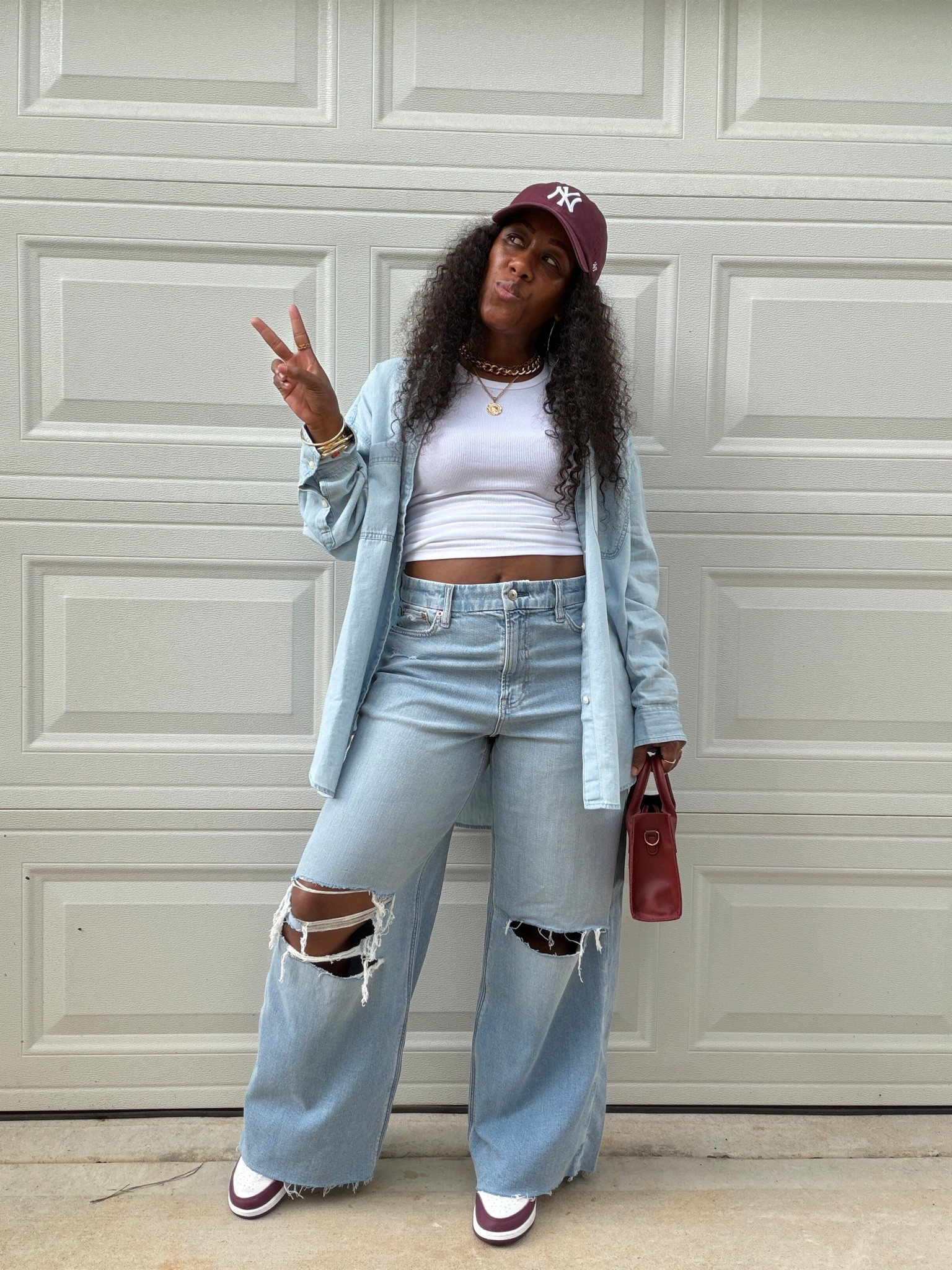 AE Curvy Super High-Waisted Baggy Wide-Leg Jean Women's Classic
Vintage Destroy 6 X-Short with Aerie Anytime Fave Woven Shirt, white tank top, burgundy NY Yankees hat, burgundy purse, and Jordan 1 Bordeaux sneakers

#LTKOver40 #LTKPetite #LTKootd