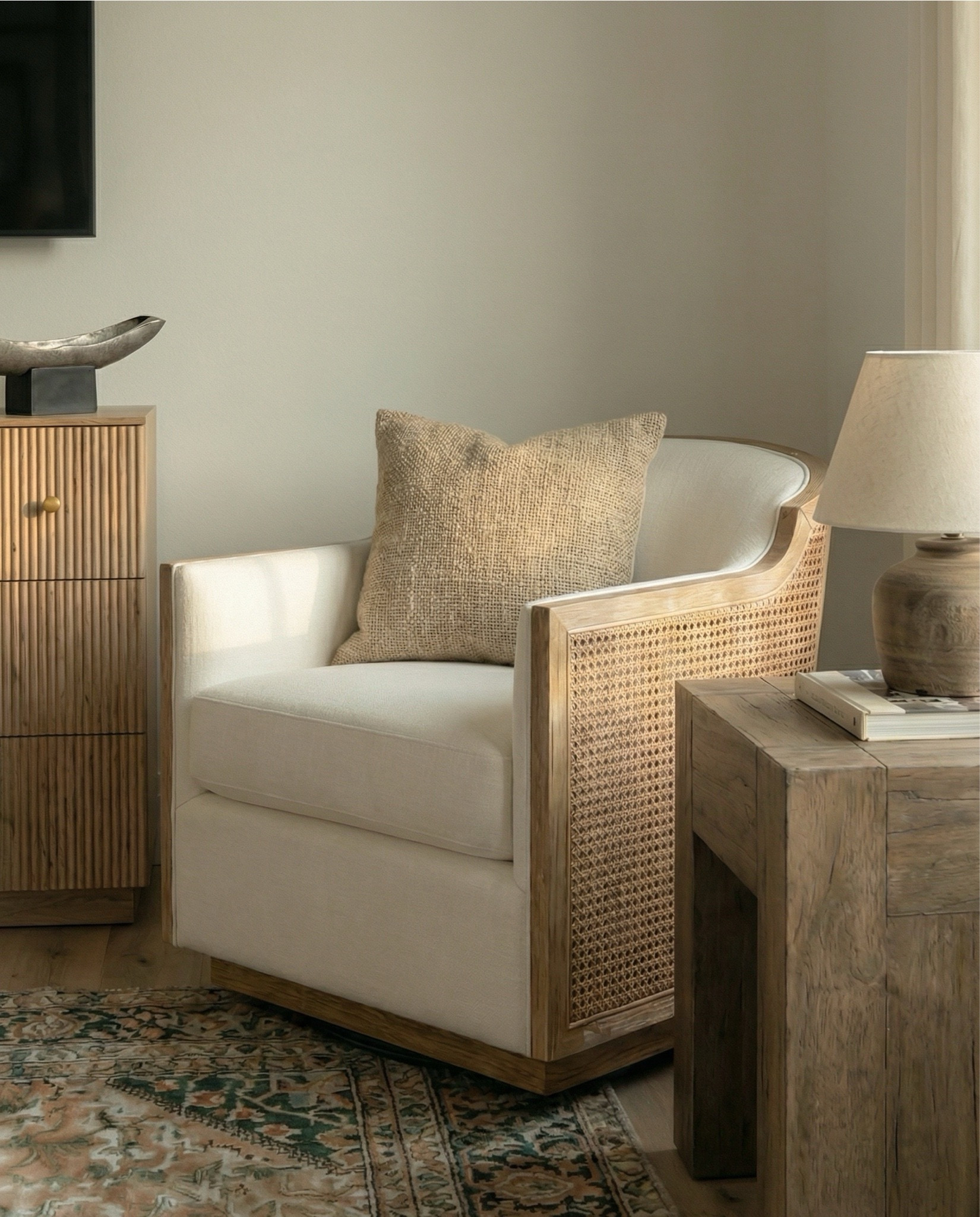 Wood canopy bed 
Brown leather upholstered bench
Brown knitted blanket
Brown throw pillows
Brown wood 3 drawer nightstands
Wall art
Glove wall lights
White tree planter
Black vase
Black table lamp
White decor bowl
Decor books
Wood dresser
Brown traditional rug 
Wood decor beads
Wood upholstered swivel chair
Wood end table
Green runner rug 
Faux olive tree 

#LTKSaleAlert #LTKHome