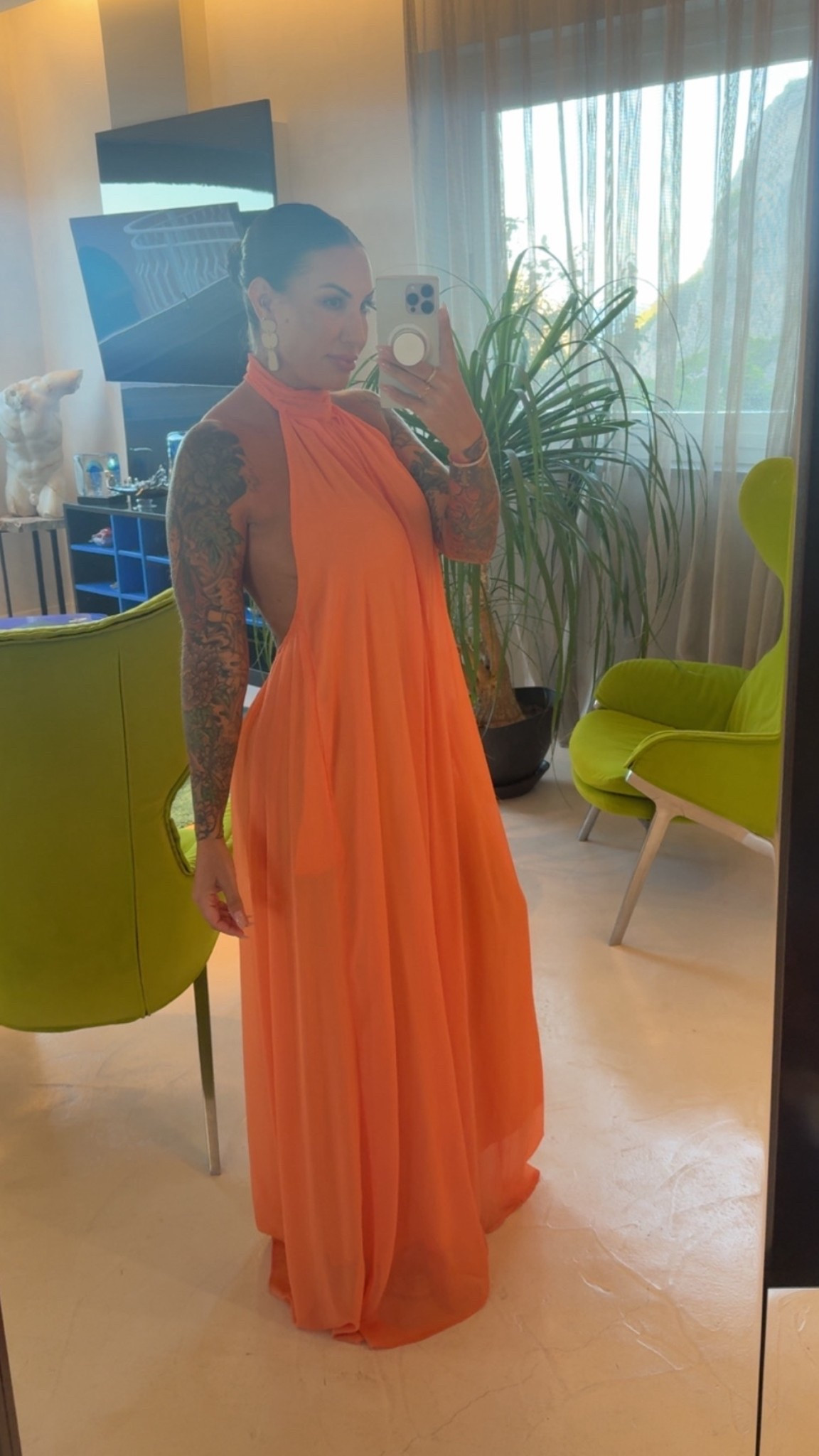 Low back flowy orange jumpsuit 

#LTKgrwm #LTKootd