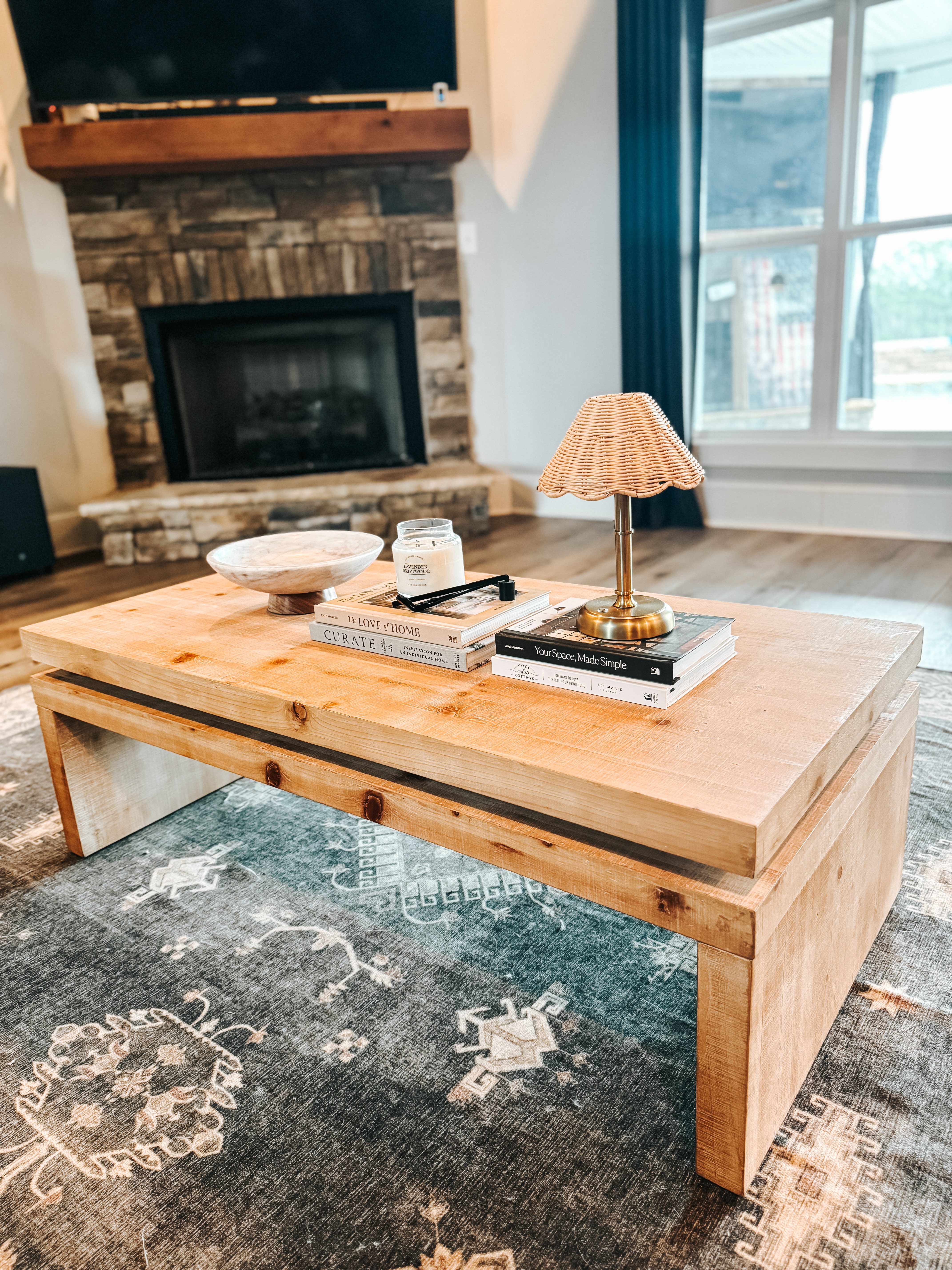 A cozy coffee table refresh ✨
This coffee table (such a good find), along with the lamp, bowl, and books, are all Amazon finds. Simple, affordable pieces that bring warmth to this space.  

 #LTKHome