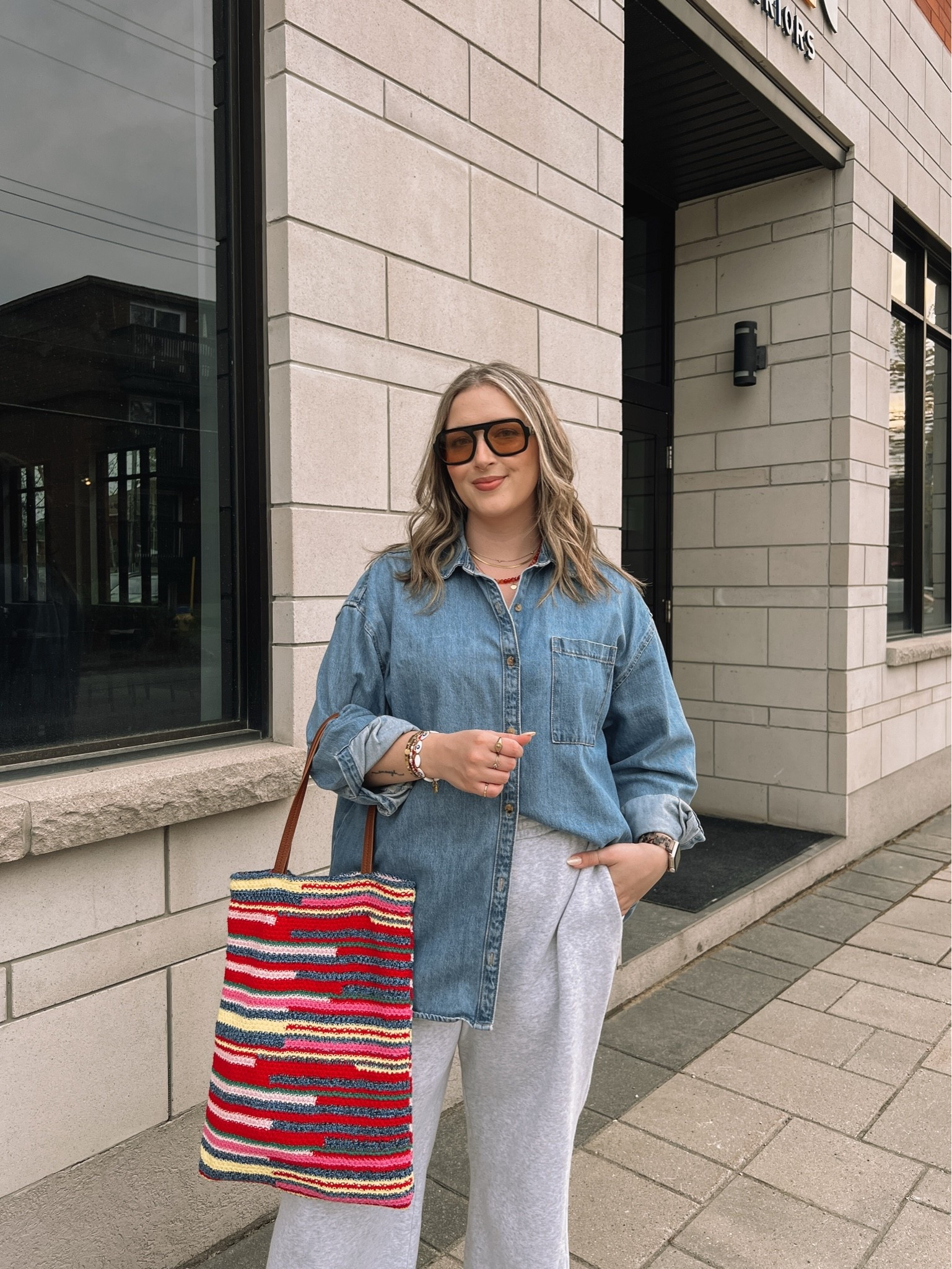 Comfy casual spring outfit! Canadian Old Navy & Gap links are under “similar products”. Wearing my usual size L in the oversized denim shirt (one of my most worn pieces!) and L in the wide leg sweatpants. This striped crochet bag is such a fun pop of color to make a simple outfit more interesting!

#LTKmidsize #LTKstyletip #LTKbag