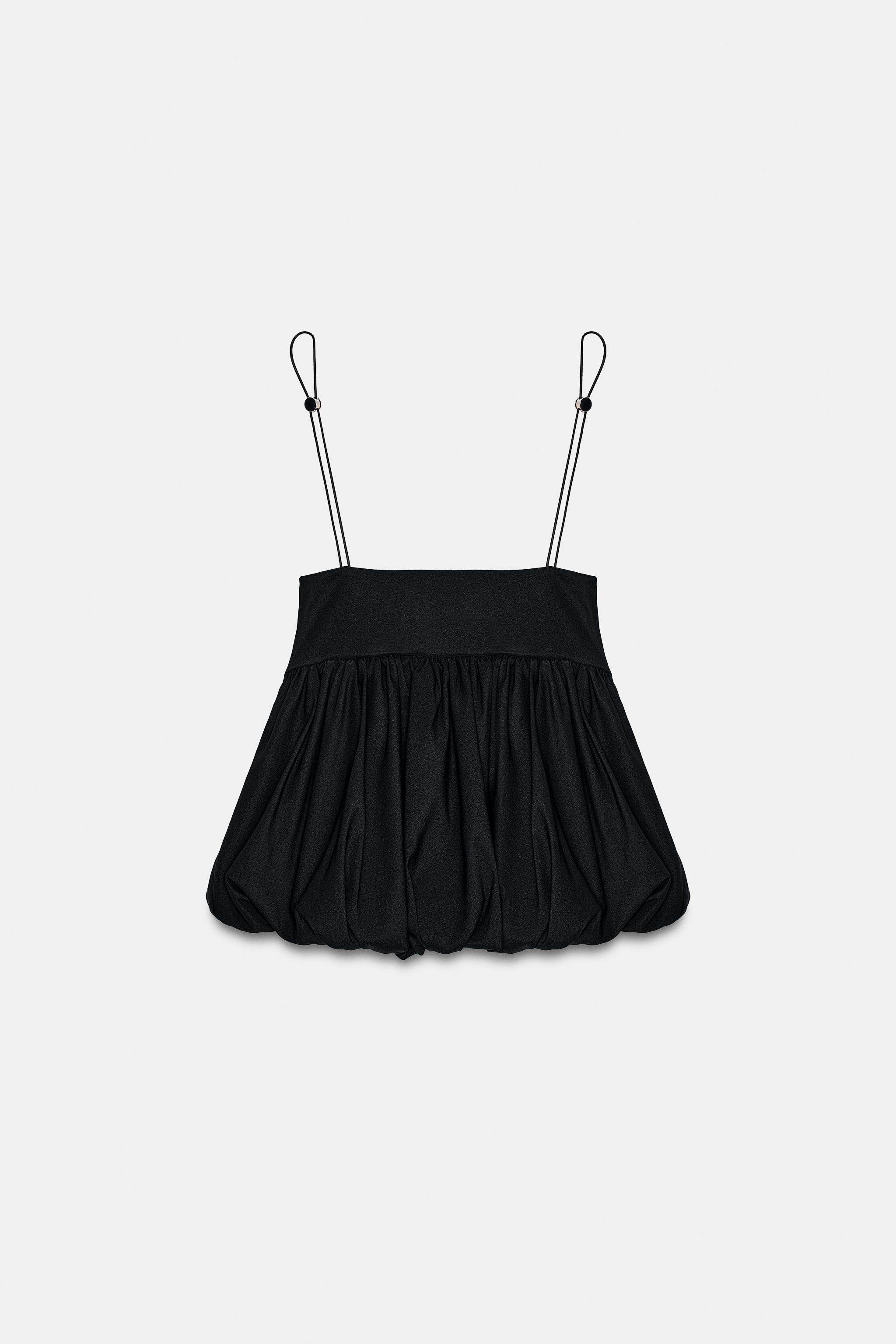 Round neck top. Adjustable elastic spaghetti straps with stoppers. Matching inner lining. Balloon... | Zara US