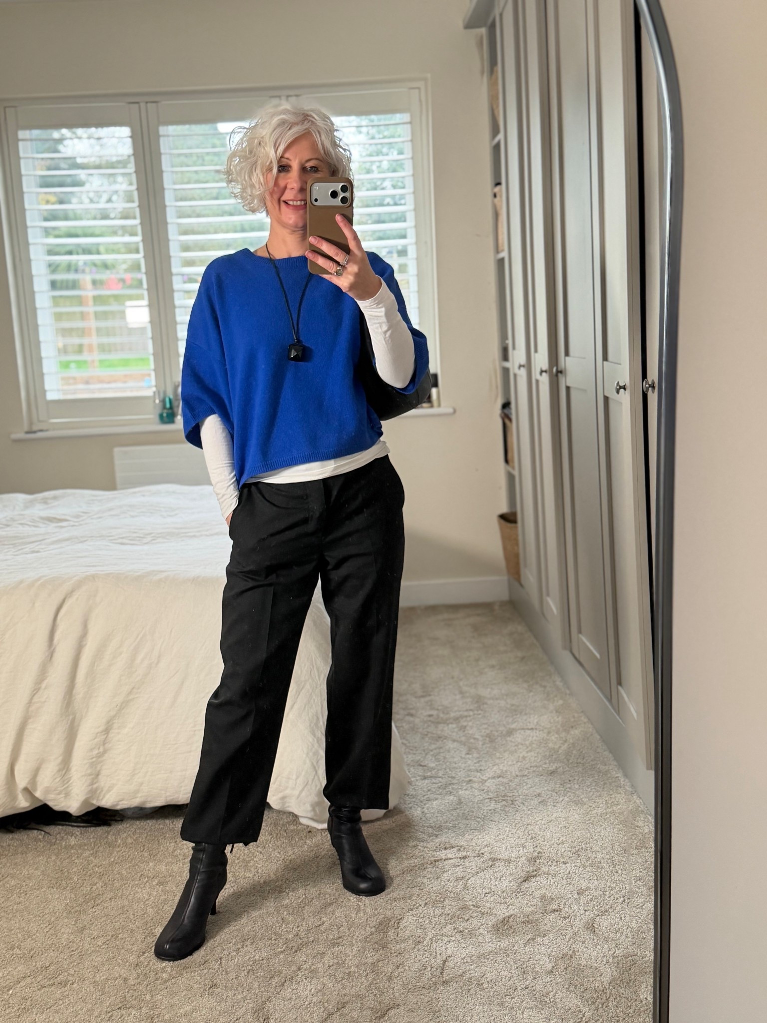 Black trousers jumper and boots 

#LTKuk #LTKFashionMonth #LTKeurope