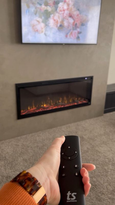 Electric fireplace insert to make your home cozy year round. I love that we can turn on the fire and use it with or without the heat settings. And the kids love that you can change the colors  

#LTKVideo #LTKsalealert #LTKhome