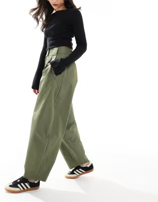 ASOS DESIGN arch leg zip detail pants in khaki | ASOS | ASOS (Global)