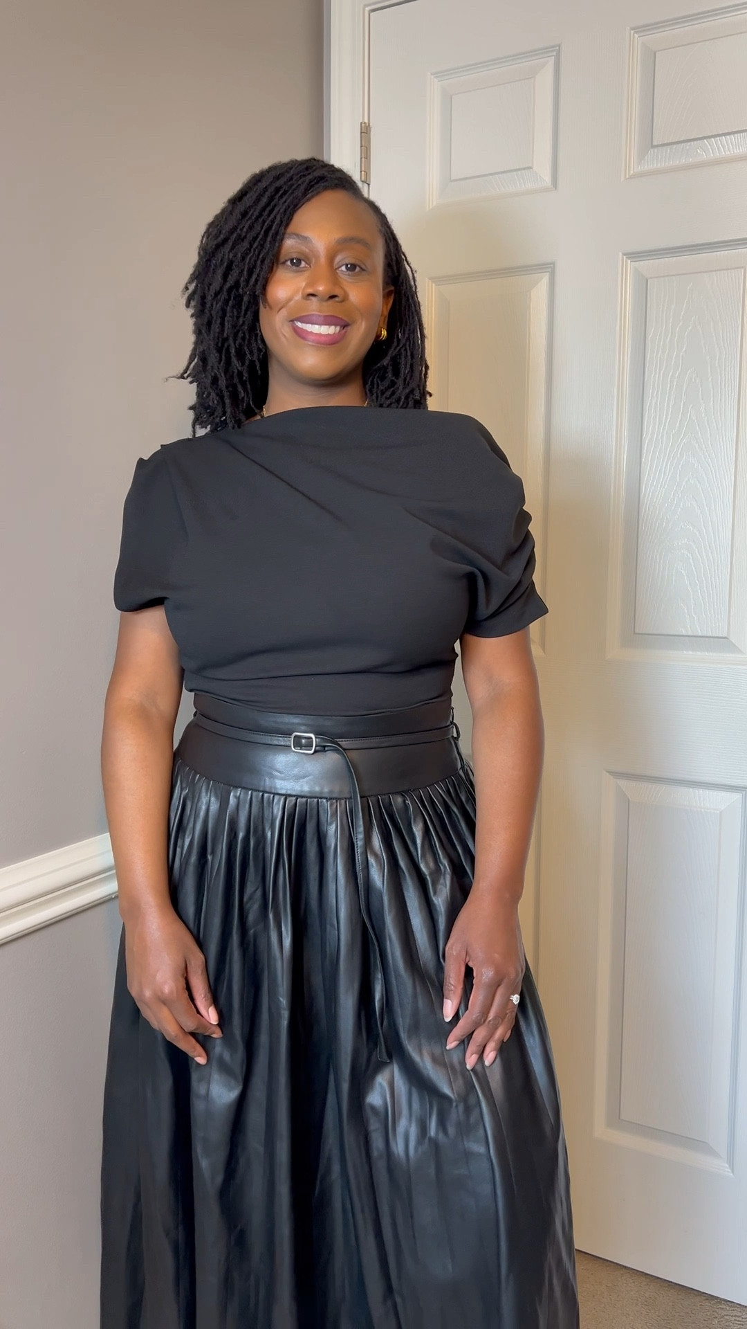 Black faux leather midi skirt from Anthropologie 

#LTKOver40 #LTKStyleTip #LTKMidsize