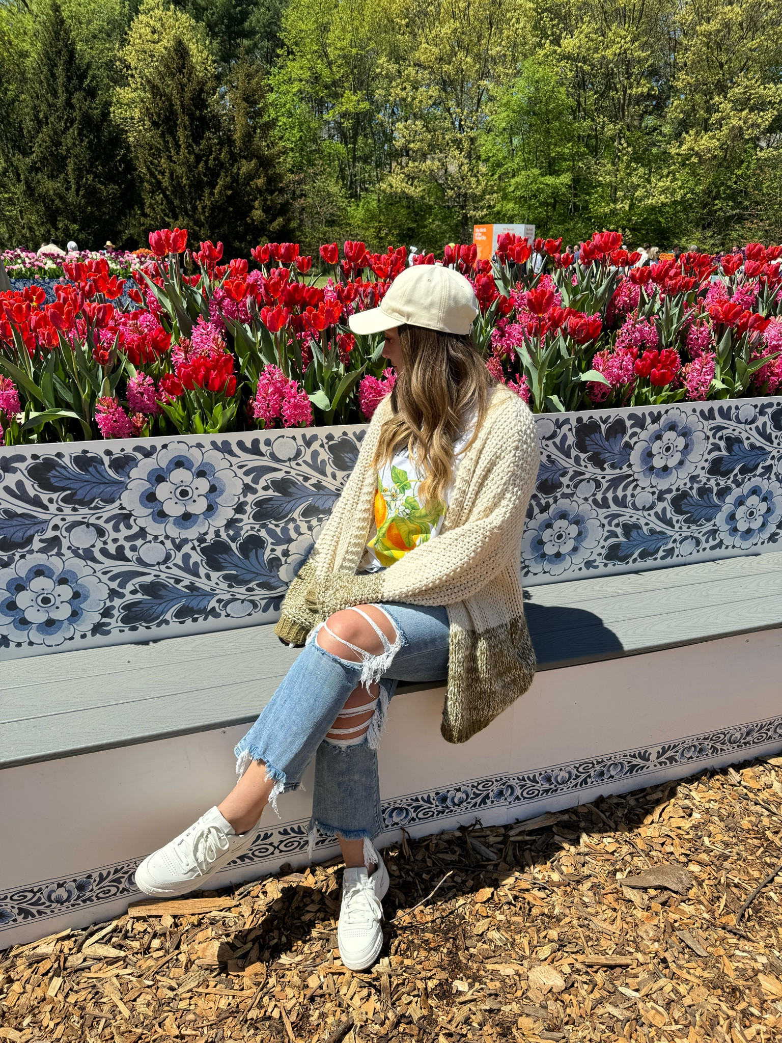 Spring outfit idea 🌷 Shop this look and get my sizing details below ✨ I wore this outfit to the Tulip Time festival & it was perfect for the 65 degree morning 🩷

My size & details (5’6” 160lbs dep. store 10)
Tee Shirt: Target oversized large 
Sneakers: Reebok true to size
Cardigan: Pink Blush old size large
Cropped Jeans: Lovervet size 9
Baseball Hat: TikTok I think?

I’ve linked similar options from Pink Blush for the cardigan. The jeans are on my TT @staycozywithjess for exact. There are a few Risen brand options, here, and I would get size 30 at my size now. 🫶🏼

You rock!
- Jess ✨

#springoutfit #summeroutfit #reebok #sneakers #cardigan #knitsweater #risen #jeans #croppedjeans #graphictee #casualoutfit #casualstyle #midsizefashion 