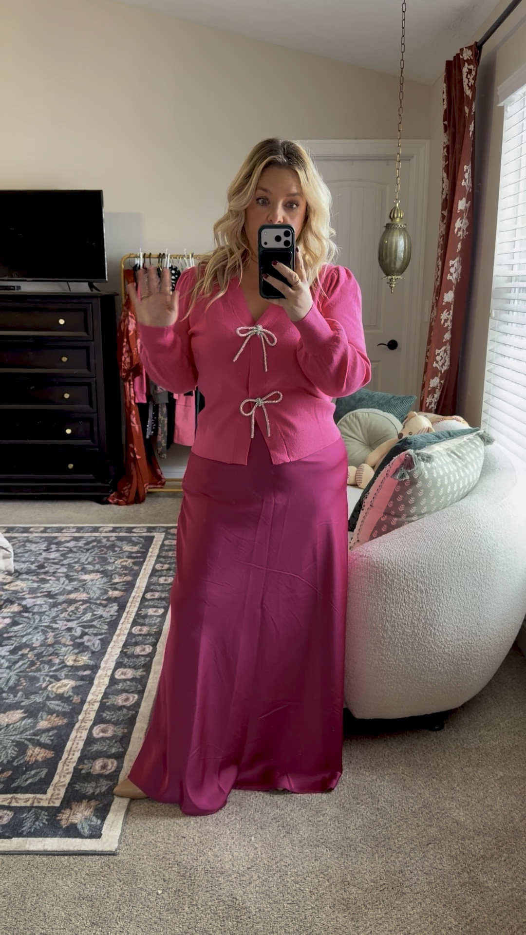 Give me all the monochromatic moments! Rhinestone bow snap cardigan is Amazon - wearing size medium, pink satin skirt is Shein - wearing sz large. So cute together for Christmas or NYE! Also linked another Shein sweater I got to wear with this skirt too!

#LTKHoliday #LTKPetite #LTKMidsize