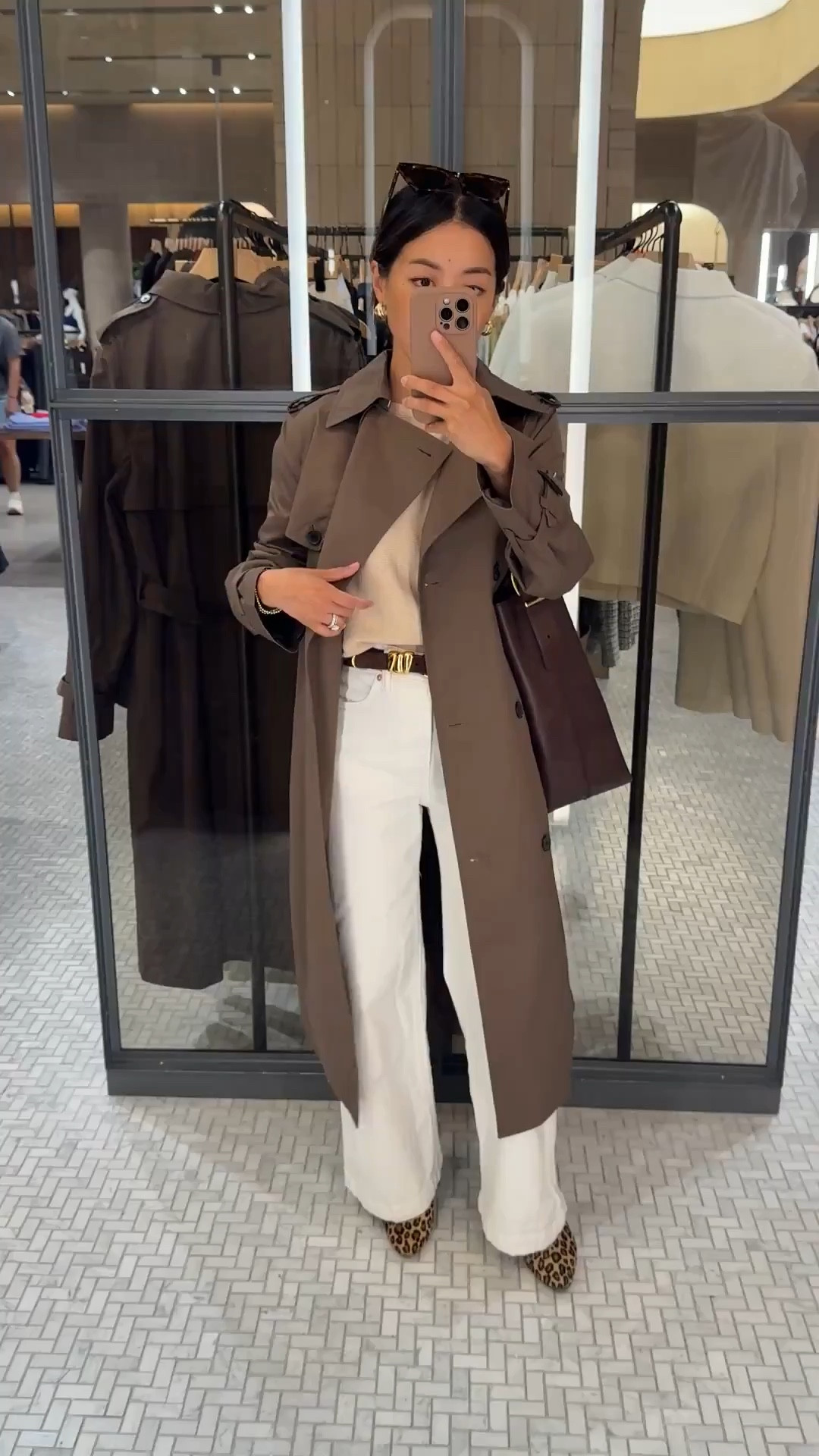 The jeans I always get asked about by strangers when I’m out! Gap and Madewell items all on sale now

• use code BEST on these Gap stride wide leg ankle jeans. size 24 regular (not petite) waist runs bigger but I love the wider cut and length on these wit flats and sneakers 

• Aritzia trench coat 2XS sleeves a little long on me. Otherwise slim fit and a chic midi length. Water resistant in light rain 

• Quince lightweight cotton Dolman sweater xs - loose oversized cut with an easy, sophisticated look. Xs is a generous fit on me, I usually tuck this and you can shrink by machine drying 

• Sezane leopard Matilda ballerina flats - worn with heel lifts so they don’t rub my ankles

• Madewell belt xxs

• Madewell bucket tote, original size easily fits a laptop.

• BP sunglasses

Spring transitional outfit that also works for smart casual office workwear, mom style, petite friendly, early fall transition outfit#LTKStyleTip
#ltkpetite #ltkworkwear

#LTKWorkwear #LTKSpringSale #LTKPetite