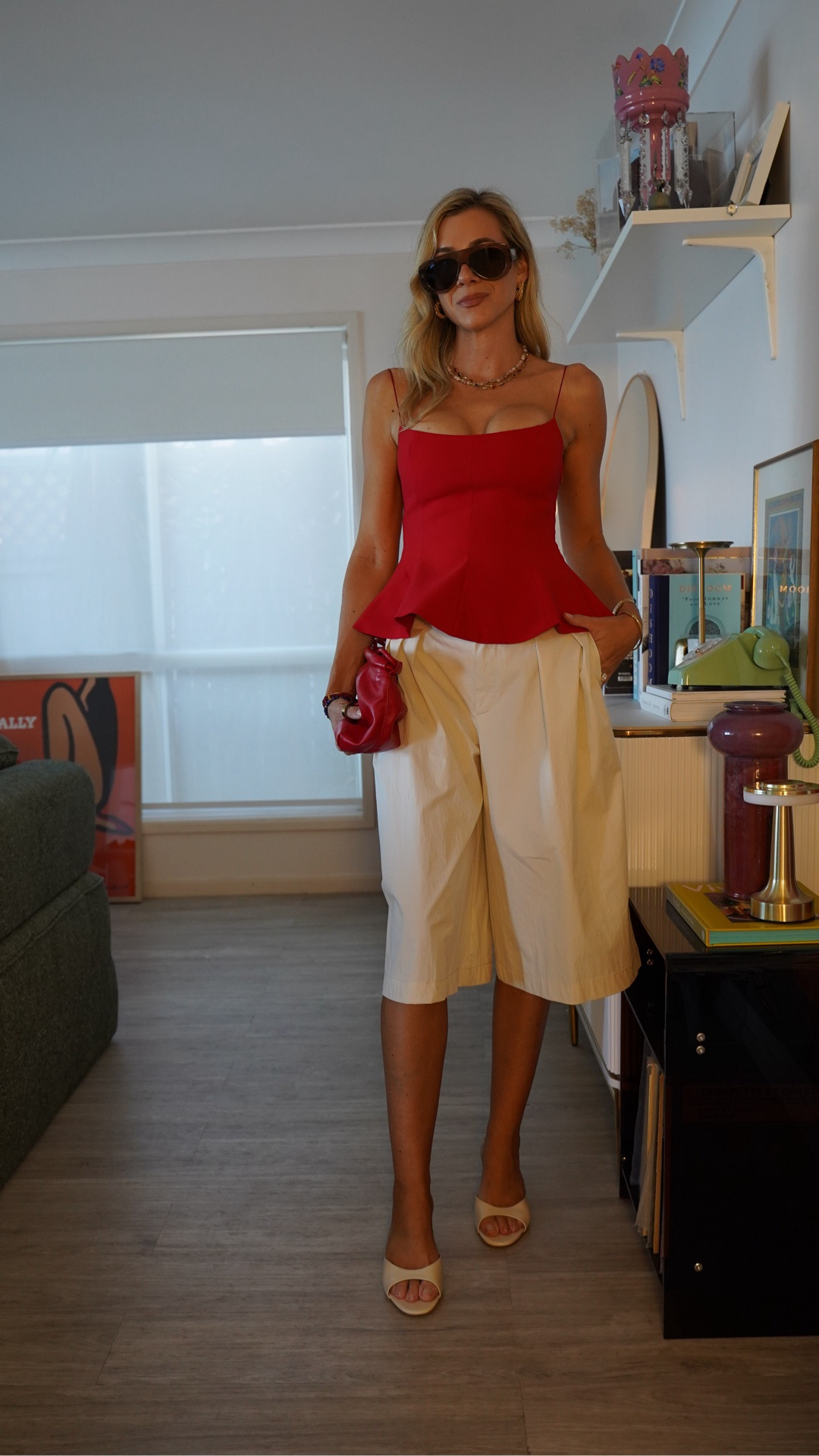 Lunch date outfit. Love this red peplum top, I’m wearing a size S and the shorts as well both from Zara the shorts are generous. 
Staud heels size 40.5
Brie Leon bag
Soda Shades sunnies

#LTKootd #LTKOver40 #LTKSeasonal