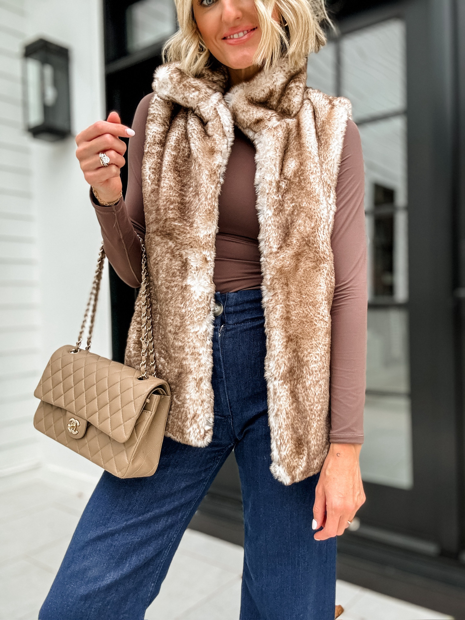 Have been obsessed with this fur vest & it’s currently on major sale! 🙌🏻 Wearing XS in vest, S in long sleeve, & 25 in the jeans!

Loverly Grey, faux fur vest, vest, wide leg jeans, long sleeve tee