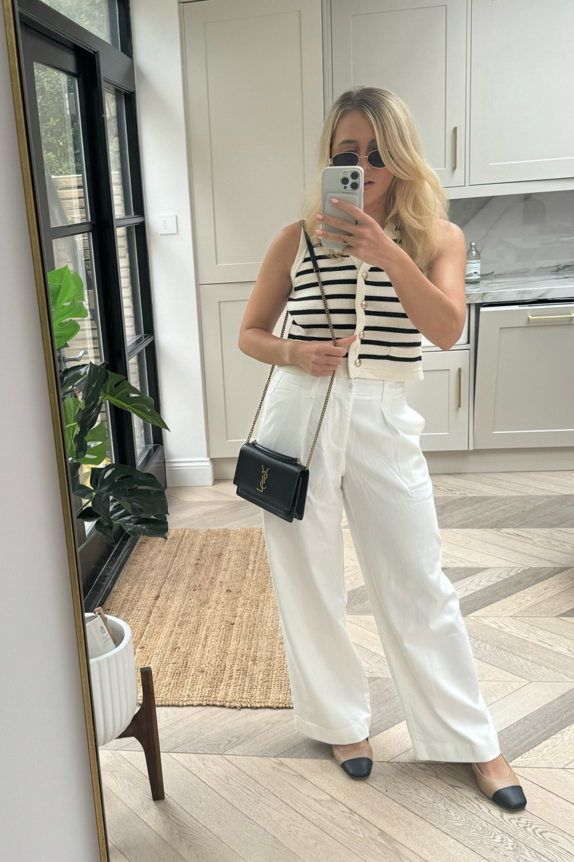 Spring outfit - summer outfit - I have a Goelia discount code: shel10 and it’s stackable with other codes - white pants - white trousers - stripe vest - striped vest - black satchel bag - black bag - ysl bag - ysl black bag - ysl satchel bag - yves saint Laurent bag - gold chain bag - summer outfit - white jeans - Chanel shoes - ysl sunset bag - sunset small bag - saint laurent sunset bag 

#LTKeurope #LTKuk #LTKshoes