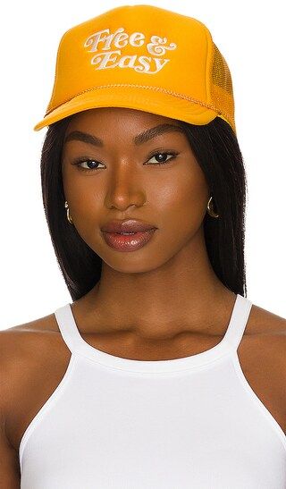 Trucker Hat in Yellow & White | Revolve Clothing (Global)
