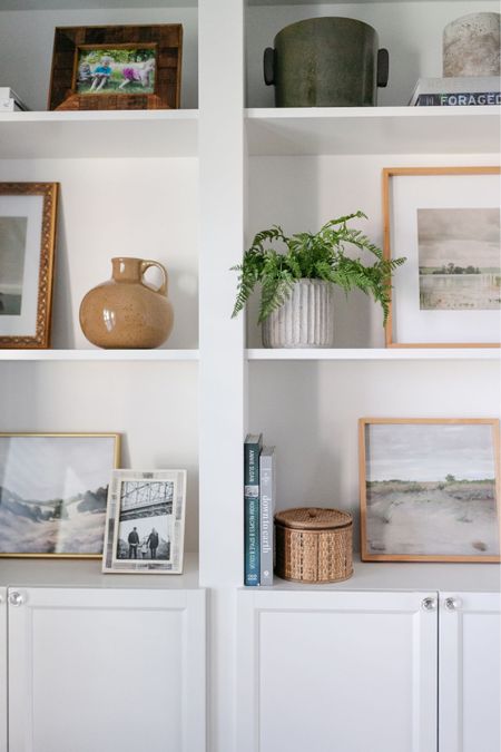 I love to add touches of summer decor like artwork to my open shelves !

#LTKhome #LTKFind #LTKSeasonal