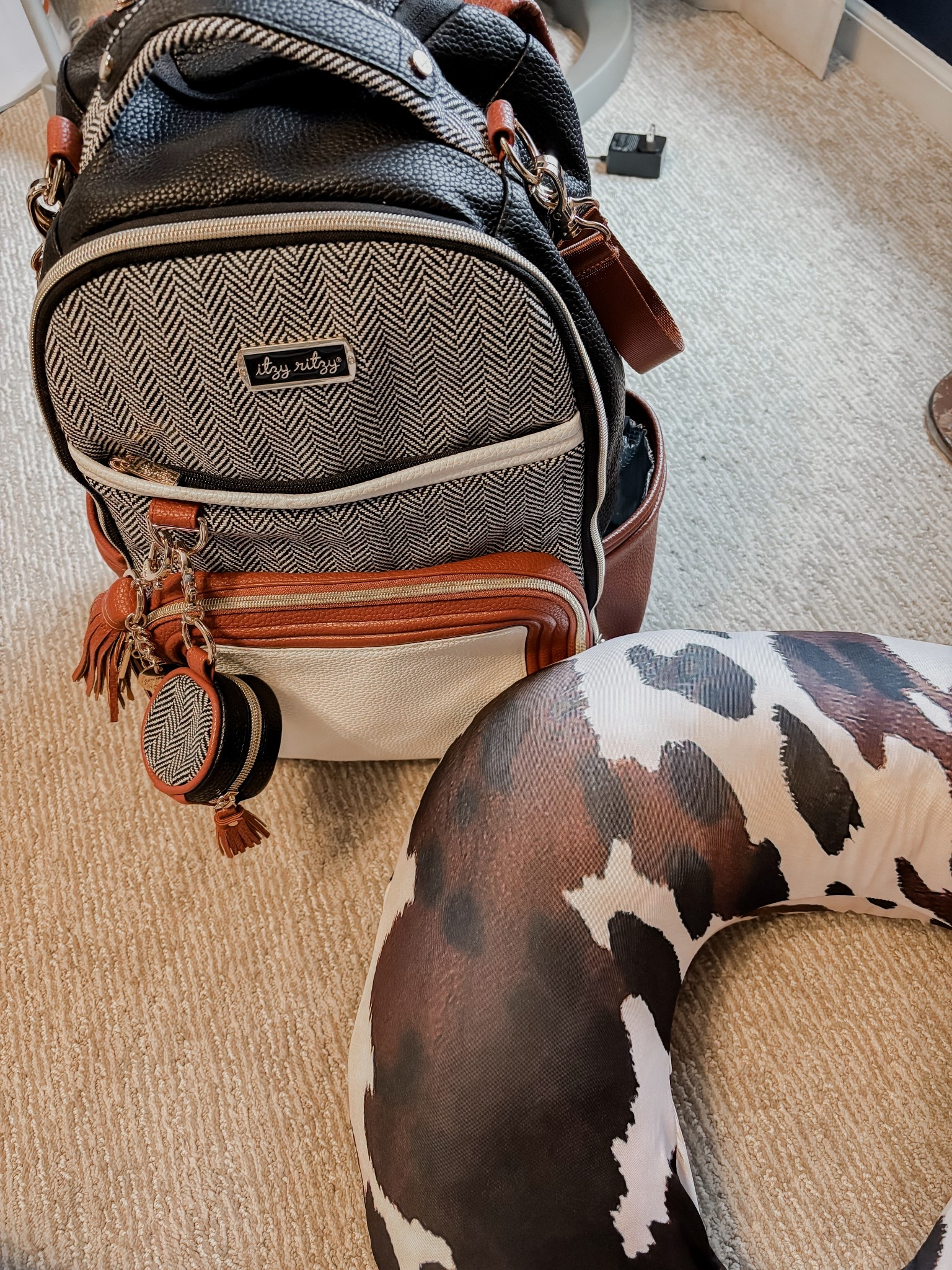 The diaper bag we chose because it has soooo many pockets, comes with a portable diaper changing pad/area for it, giant cup holders an a pacifier holder. 

Also, love this cow print cover from Amazon for the boppy! 

#LTKKids #LTKmomlife #LTKBaby
