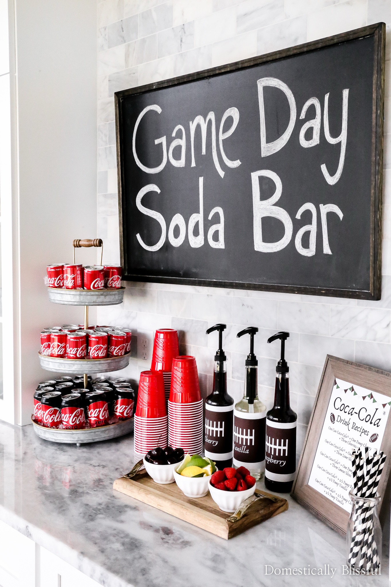 Create a great game-day soda bar for!

See tutorial: https://domesticallyblissful.com/how-to-create-a-game-day-soda-bar/

#LTKSuperbowl #LTKGameday 

#LTKFindsUnder100 #LTKParties #LTKSeasonal