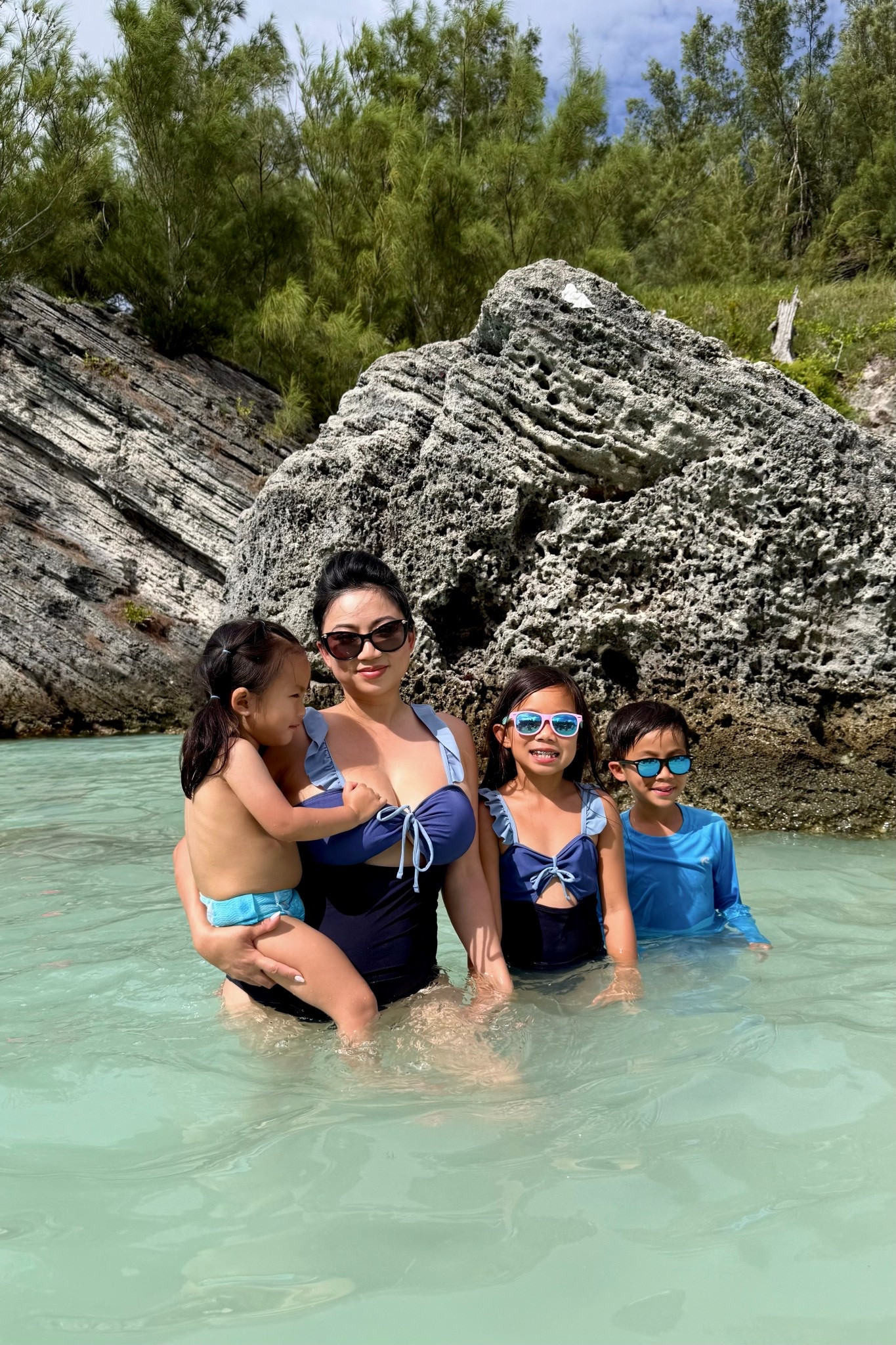 Family Matching Swimsuits // Matchy matchy with the family from dad to baby with these blue hue bathing suits. Sweetheart neckline with ruffle straps and cutout one piece for the girls and tri color block shorts for the boys.

#LTKFindsUnder50 #LTKSwim #LTKFamily