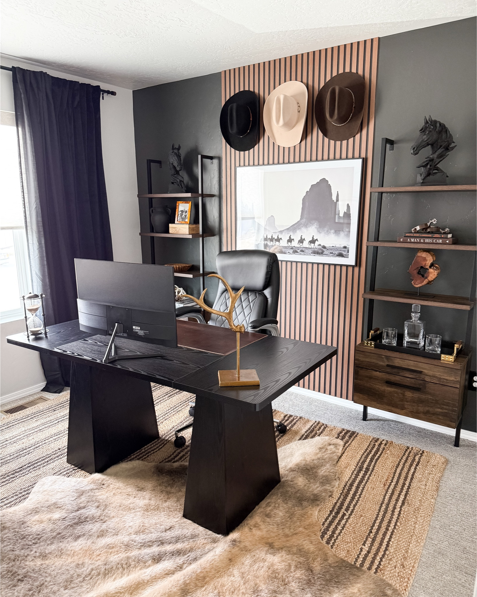 Wild West home office transformation! My client wanted moody cowboy vibes and we did it with so many amazing budget finds! All linked

Home office, office, office decor, home decor, desk, chair, art, large art, cowboy, cowboy vibes, western, western art, cowboy art, cowboy hat, bookshelves, paneling, rug, cow hide, cowhide, gallery wall, art prints, wall art, office chair, leather chair, budget friendly, statement wall


#LTKFindsUnder100 

#LTKHome