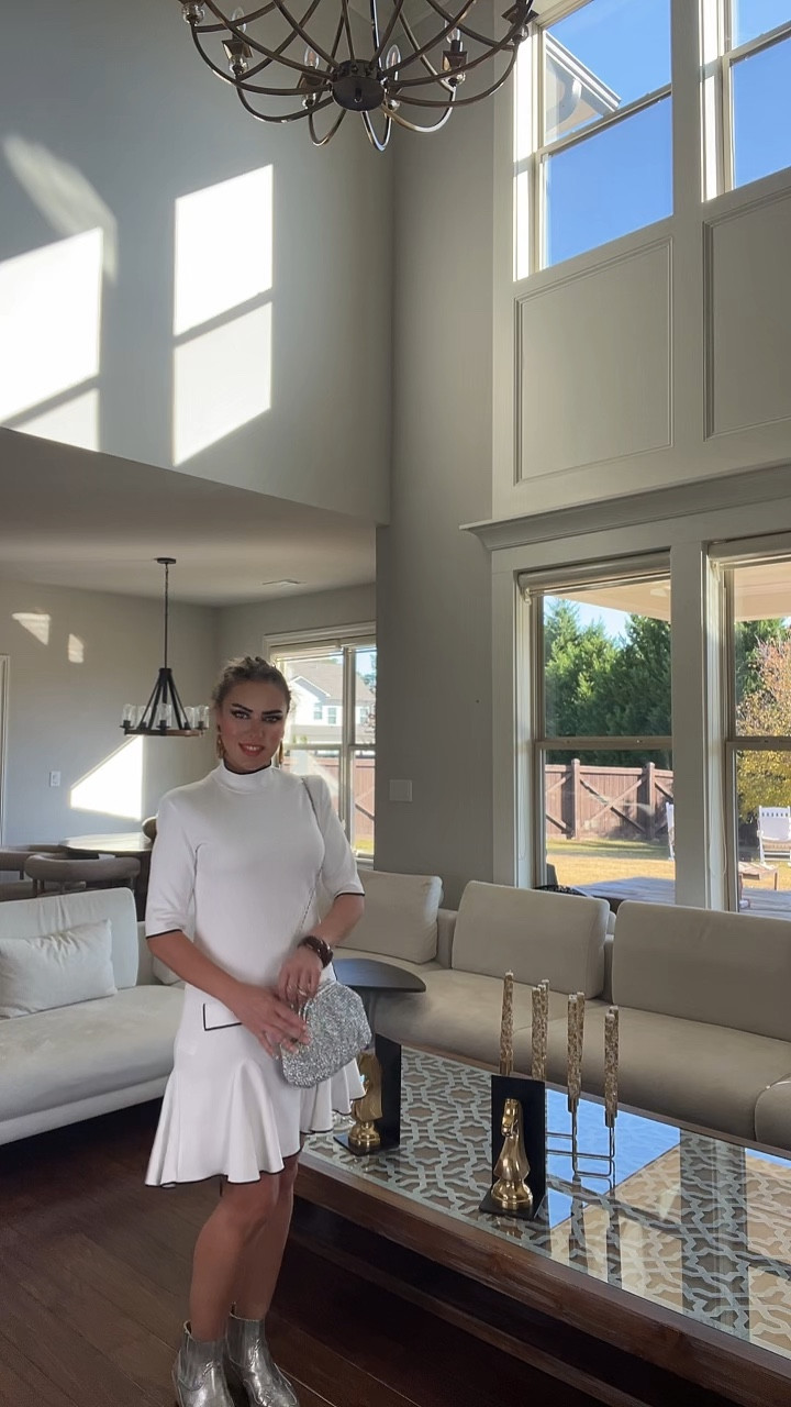 Brand: OWEIEYEU
Women's Slim Stand Collar Short Sleeve Wavy Wide Hem Mini Dress Casual Street Dress

This outfit shimmers under the lights as I move with grace. Clean lines, a touch of character, and a rhythm of energy dance in harmony. Paired with my shiny, metallic boots and a small, simple bag, this look sends a **signal of power** on stage. As I dance to the rhythm that fills me, its permanence becomes even more evident.

💃💃
The fluidity of my outfit, accompanied by the music, harmonizes with the magical power of the melody "Parla più piano." In my home, filled with light plays reaching up to the sky, this outfit is at the peak of my energy: brisk steps, clean lines, and a graceful symmetry of movement💫🫶✌🏻💃💋

- #EnergeticStyle
- #ShineWithDance
- #FlawlessStyle
- #RhythmInFashion
- #ShineWithPiano


#LTKStyleTip #LTKActive #LTKHoliday