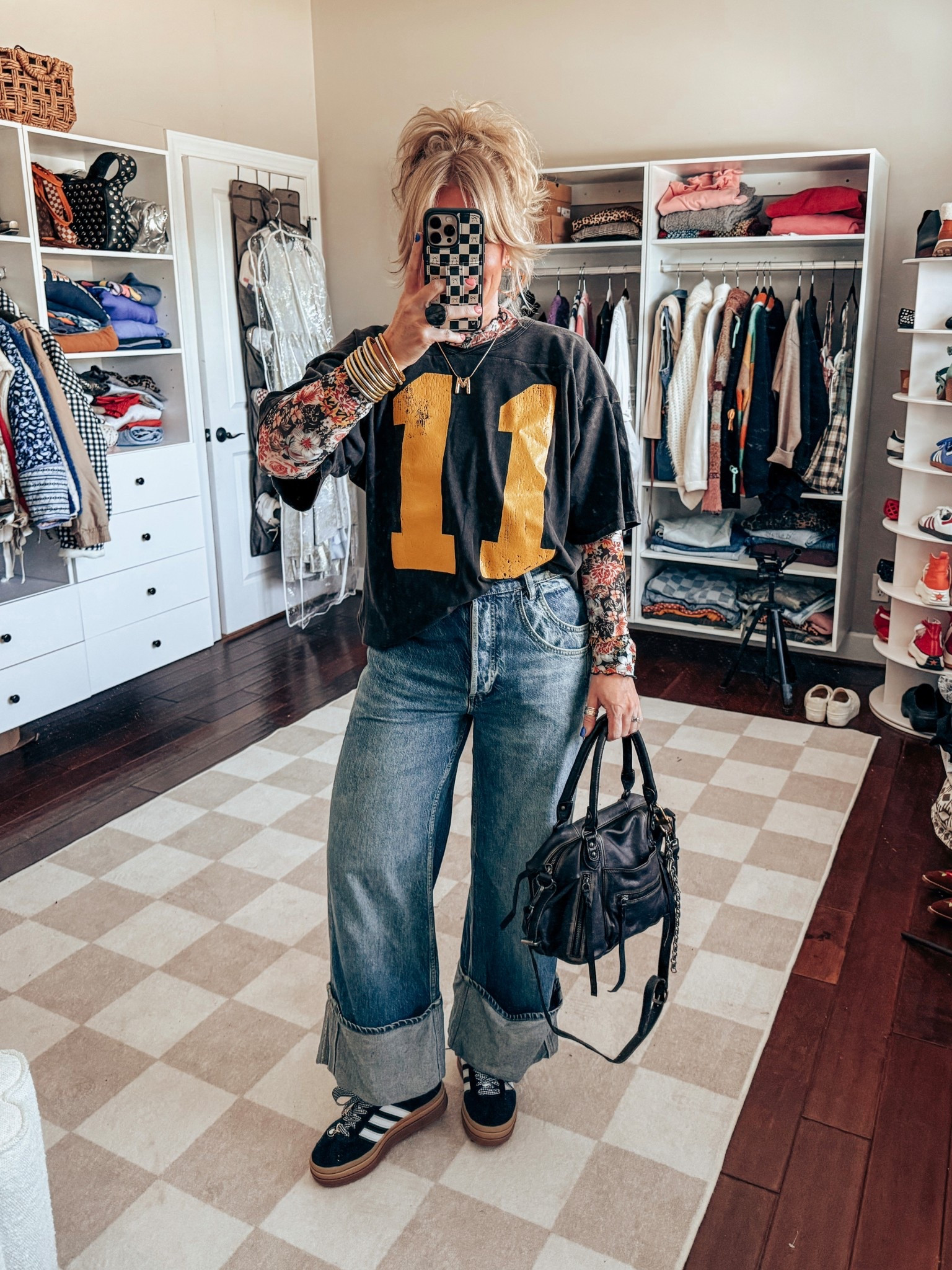 Love this tee and these cuff jeans! 
I sized down one size in these jeans and this tee is a medium. 


#LTKStyleTip #LTKOver40 #LTKFindsUnder100