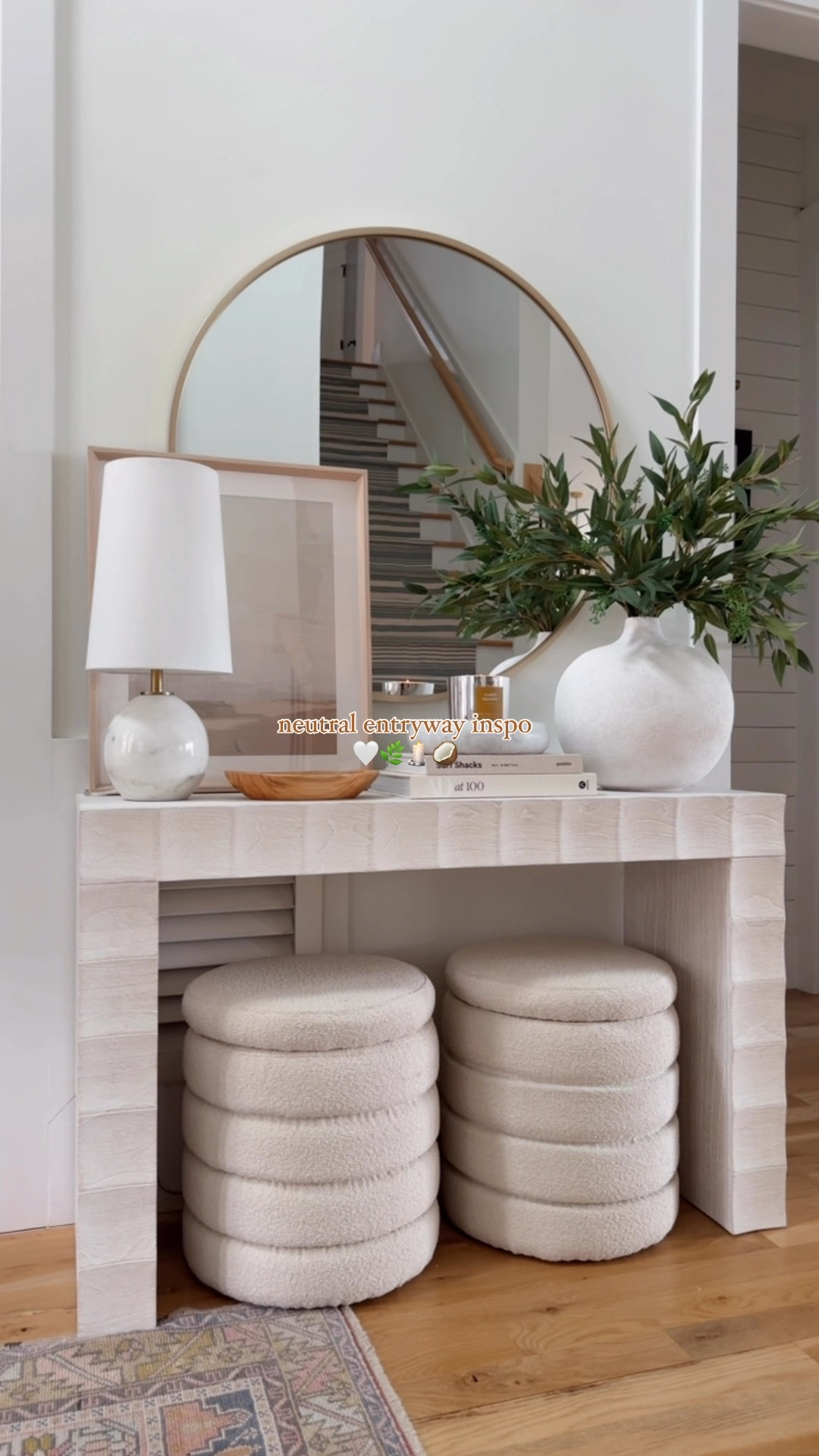 neutral entryway with purpose 💫🤌🏼 | you can never have enough hidden storage with kids & these ottomans are literal chefs kiss, a yummy candle + a little wooden bowl for keys & the best oversized round mirror to complete this small but functional entryway 😮‍💨

#entryway #entrywaytable #entrywaydecor #homestorage #organizedhome #consoletable #homegoods #homegoodsfinds #affordablehomedecor 

#LTKHome #LTKStyleTip #LTKFindsUnder100