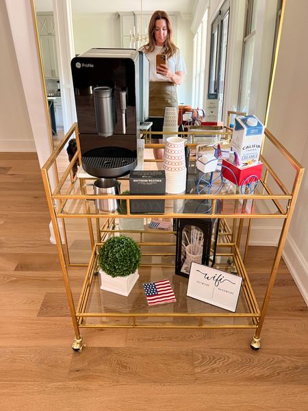 I created a little self-serve coffee bar cart for the family visiting this week. I love bar carts for this exact reason - they can be decorative or functional. The espresso machine was a hit for our tired travelers. How cute is the WIFI sign for guests too? Making it easy instead of trying to locate the password you have to look up every few months. PS the bar cart is 25% off today! 

#LTKsalealert #LTKstyletip #LTKhome
