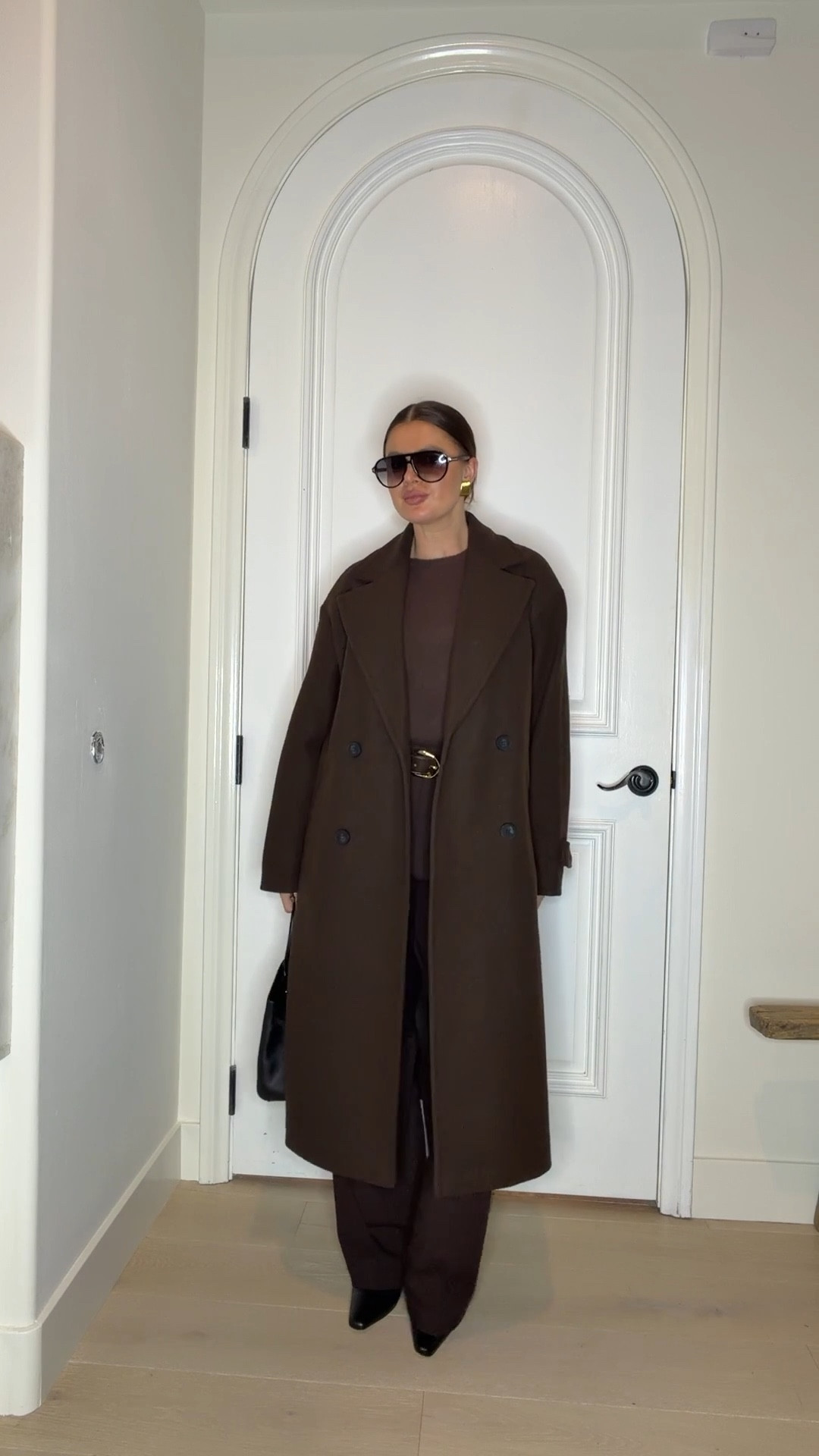 Styling an espresso brown coat with a brown sweater, wide leg pants, a black leather tote and black booties. Adding black sunnies and gold jewelry to elevate the look 
#coat #widelegpants #brown #espressobrown #darkbrown #chocolatebrown #bootie #boots #black #tote #winter #fall #outfit #aviators #zara #mango #tomrford #demellier #staud  

 

#LTKWorkwear #LTKootd #LTKFindsUnder50 #LTKFindsUnder100 #LTKgrwm

#LTKSeasonal #LTKTravel #LTKSaleAlert