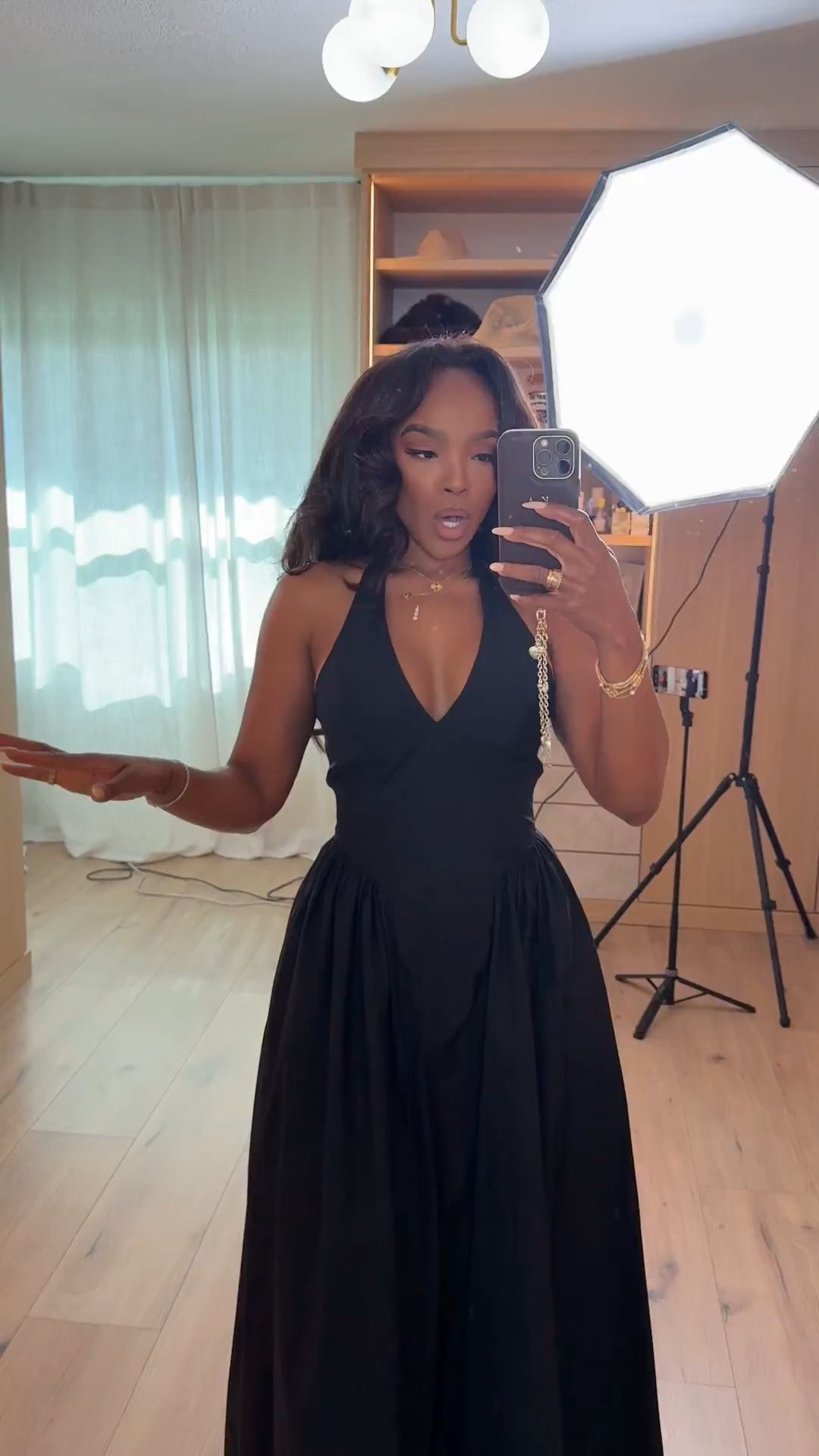 This black dress is what I mean when I say effortless elegance 🖤

The flowy silhouette, open neckline, and dramatic movement make this look feel so elevated and expensive while still being simple enough to wear over and over again. Add layered gold jewelry and soft glam and suddenly it’s giving luxury vacation dinner energy.

Perfect for vacation nights, summer weddings, date nights, rooftop dinners, birthday dinners, or elegant resort looks.

Affordable statement dresses styled with luxe-inspired accessories will always give the most high-end look without the designer price tag. This is one of those timeless pieces that never goes out of style, so the cost per wear becomes so worth it.

5’4 | 140LBS | 34D-27-40 | size small or 4

Black maxi dress, elegant vacation outfit, classy dinner outfit, resort wear women, all black dress outfit, luxury inspired fashion, summer wedding guest dress, feminine elegant style, chic vacation looks, flowy maxi dress, date night dress

#LTKstorytime