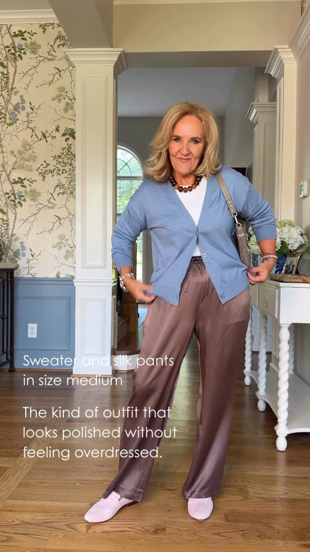 I really like the blue and chocolate together here. I’m wearing a medium in the sweater and silk pants, with a large white tee underneath.

#LTKootd #LTKPetite #LTKOver40