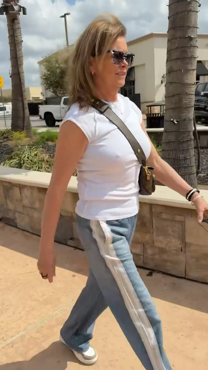 Have to share my mom’s outfit! She looks so cute! 
Nordstrom sweatpant jeans. I love the side details. 
Free people top
Alo sneakers 

#LTKOver40 #LTKootd