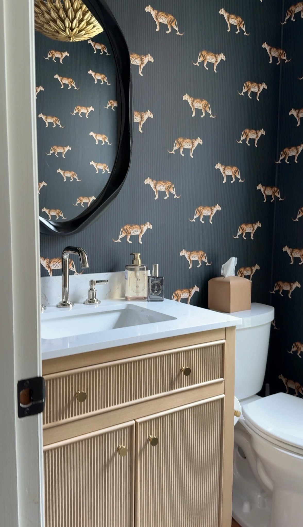 The vanity in our powder bath is such a statement piece — and I get asked about it constantly! The best part is the countertop and cabinetry you hardware comes with it. All you need to add is a beautiful faucet and you’re all set!￼ 🖤
#PowderBathroom #VanityDecor #BathroomVanity #HomeReno #BathroomDesign #InteriorDesign #LTKHome #BathroomInspo
