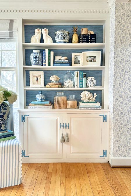 Backed bookcases either this blue peel & stick grasscloth -nd decor details of these shelves 

#LTKSaleAlert #LTKStyleTip #LTKHome