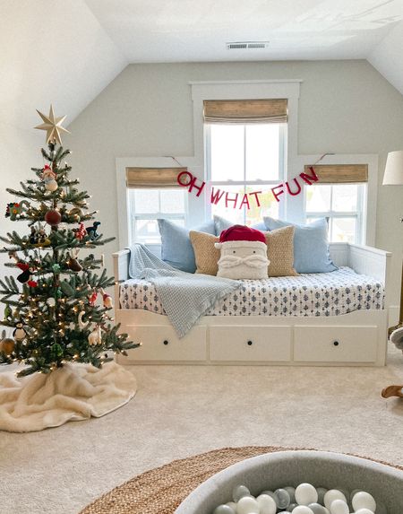 Playroom Christmas decor! 

Hearth and hand, Christmas tree, Santa pillow, Ikea daybed, star tree topper, felt ornaments, world market ornaments, west elm ornaments, coastal playroom 

#LTKhome #LTKkids #LTKHoliday