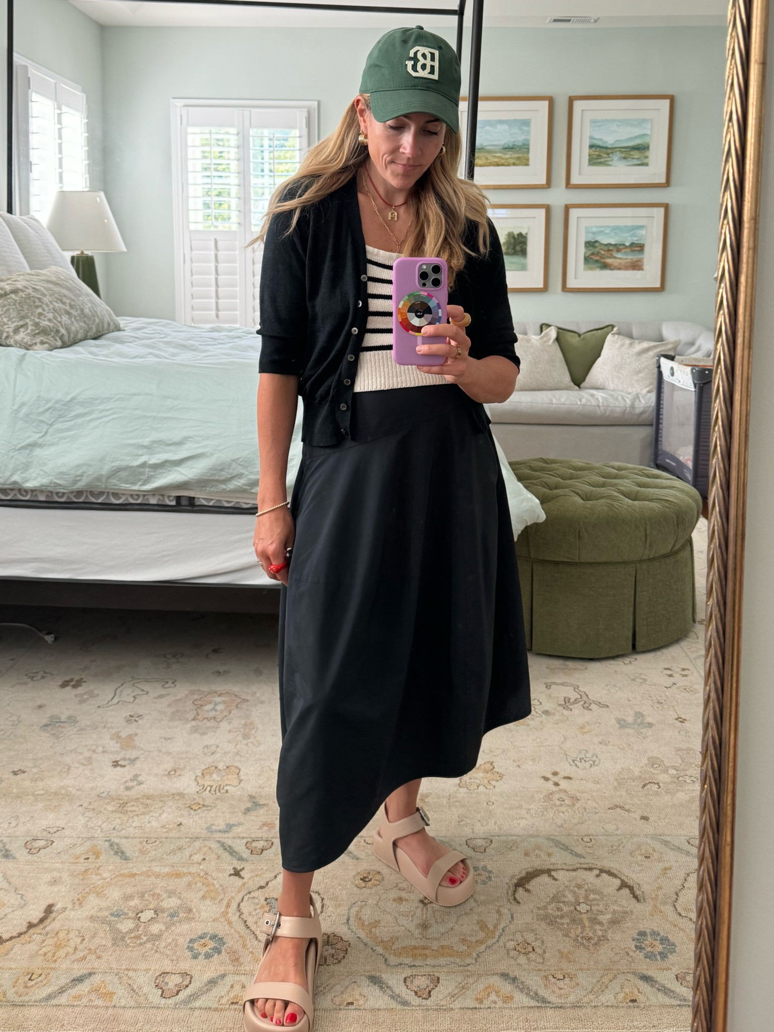 The balloon skirt dressed down with a beachy top, but kept polished with a cardigan