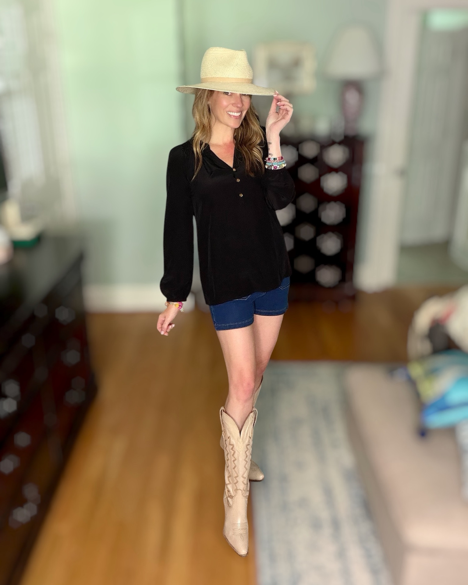 Black Top + Denim Shorts + Western Boots 🤠✨

A simple black blouse is one of the hardest-working pieces in your closet! Paired with dark wash utility shorts, neutral western boots, a woven hat, and colorful stacked bracelets, this outfit is equal parts classic and fun. Perfect for summer concerts, casual dinners, vacation days, or running errands in style. 🤍✨

I’m wearing the Lilly Pulitzer Elsa Silk Top, denim utility shorts, Dingo western boots, the Sherman hat, and layered colorful beaded bracelets for a playful pop of color. 🌈🤠

#LTKStyle #LTKFashion #SummerStyle #WesternChic #LillyPulitzer #CowgirlStyle #CasualOutfit #PreppyStyle #SummerOutfit #LTKFinds

#LTKOver40 #LTKootd #LTKPetite