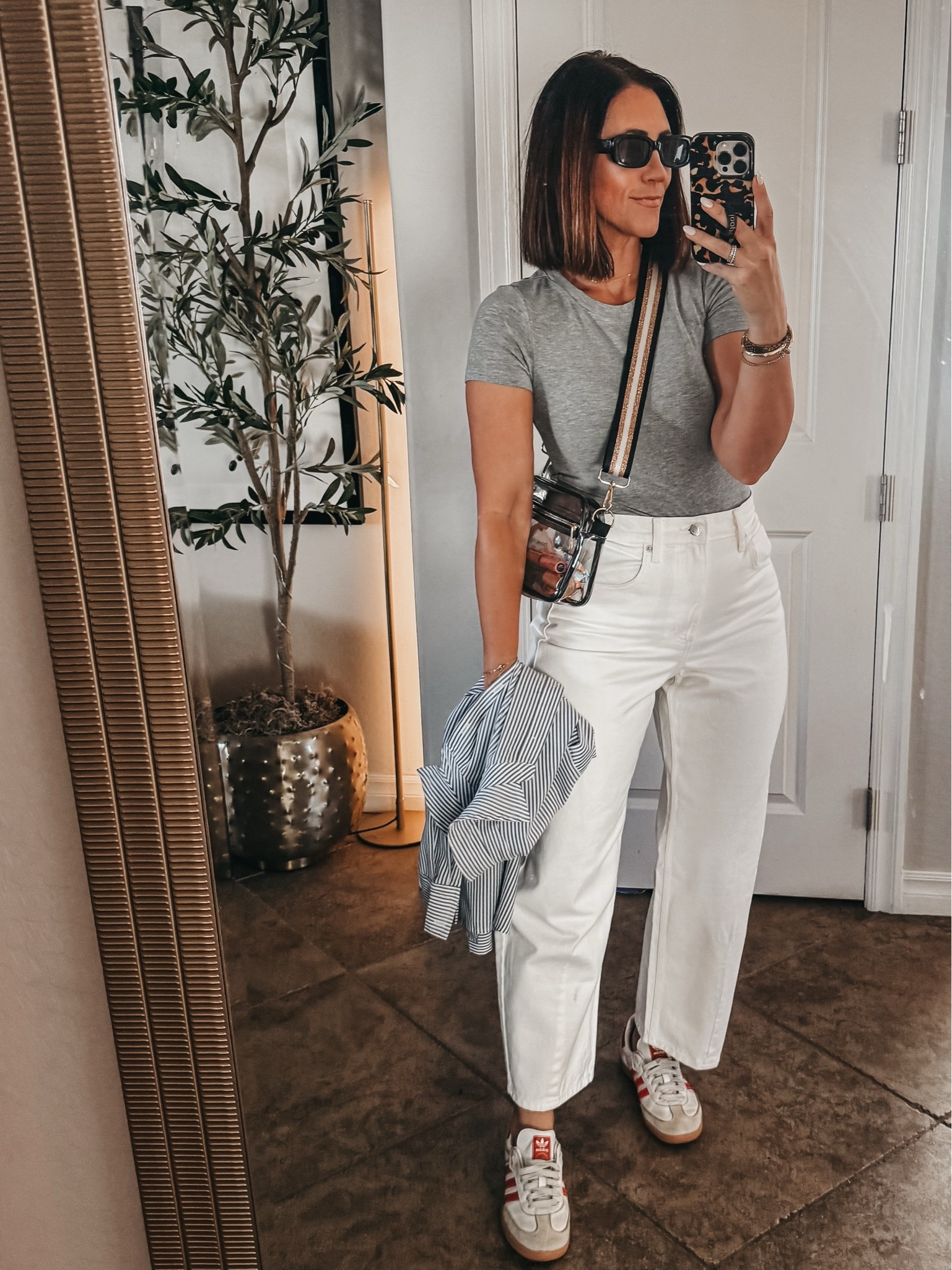 Casual summer outfit for a baseball game! 💙Headed to Chasefield to watch the diamondbacks vs Dodgers! 

White Barrel leg jeans - size 6, bodysuit - size, small
striped button-down — size small

#LTKootd #LTKSaleAlert #LTKOver40