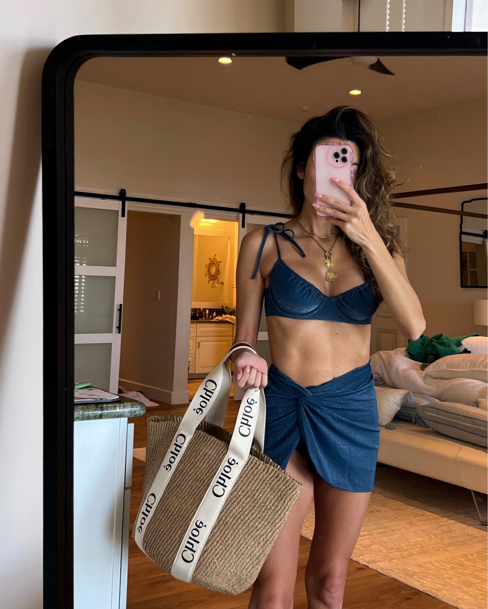 Vacation outfit swimsuit runs large size down. Wearing xs in swim coverup skirt and bottoms and small in top. 

This will be my most worn super straw tote. Chloe tote will probably sell out soon. 

Christine Andrew, spring break, swimsuits, swim coverup, navy, spring break trends, designer bags, vacation bag 


#LTKU #LTKswim #LTKunder100