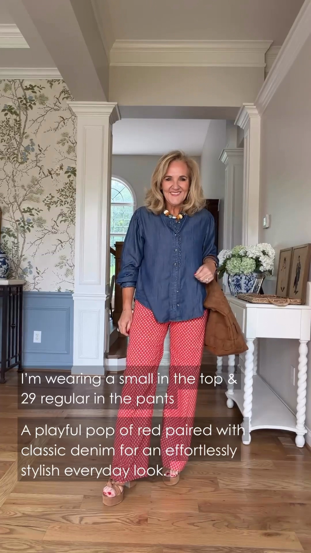 This chambray button-front blouse and red printed pants are such a fun combination. The relaxed fit keeps the bold print comfortable while the denim adds a classic touch.

💡 LTK MADE EASY
❤️ Heart = Support my posts!
🔖 Save = Get sale & restock alerts
📋 Lists = Keep favorites organized
📲 Share = Send lists and products to a friend. Hello, Christmas List!
💬 Comment = Ask me anything about what I'm wearing.:-)

#LTKdayinmylife #LTKgrwm #LTKootd