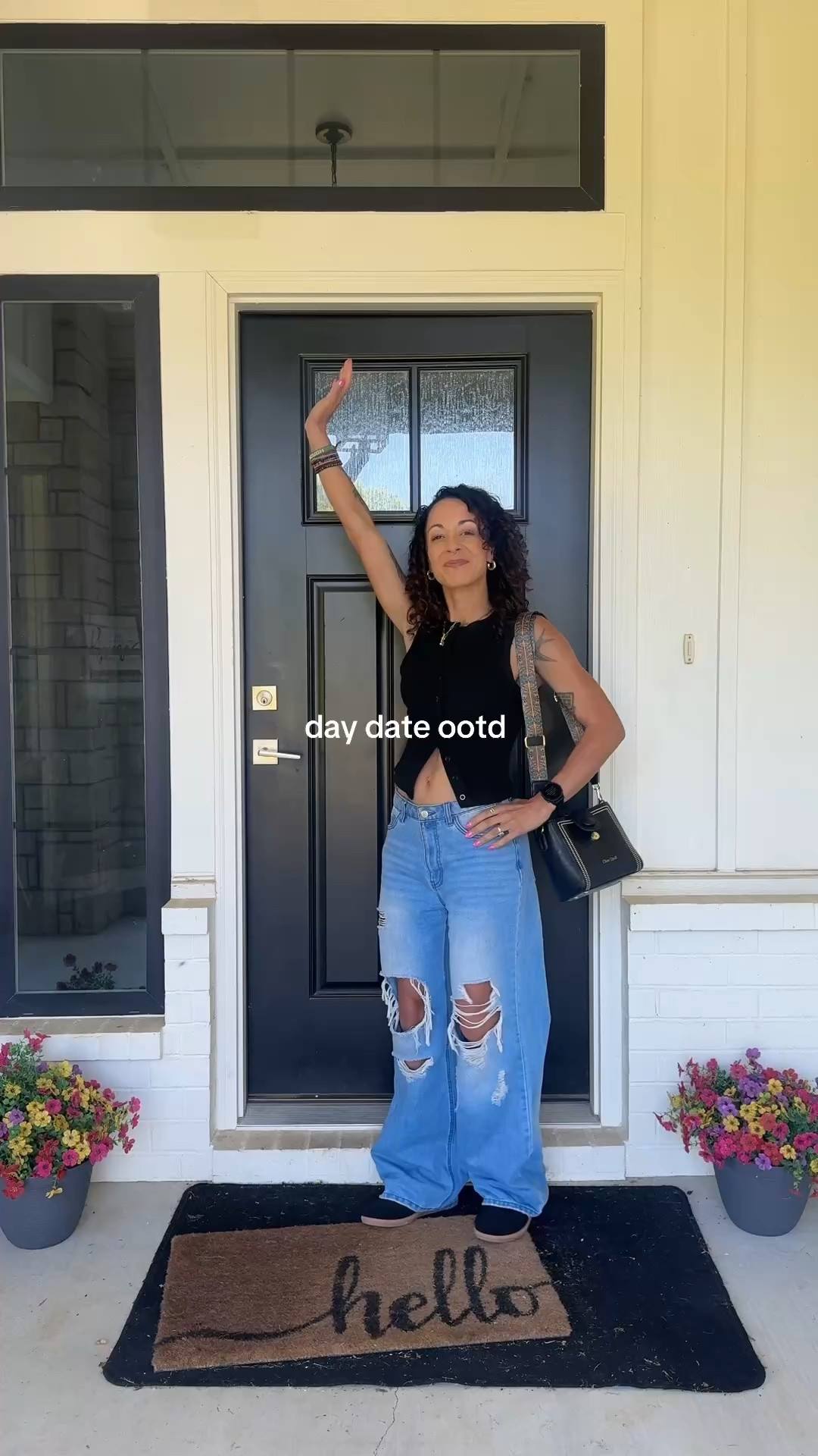 Day date approved and I’m obsessed with how this came together. Black sleeveless crop tank tucked into high-waisted distressed wide-leg jeans — casual but make it cute. Finished it off with black sneakers, a structured black crossbody, gold chain necklace, and gold hoop earrings. Everything is linked below — this whole look is so affordable and so repeatable.

#LTKootd #LTKOver40 #LTKdayinmylife