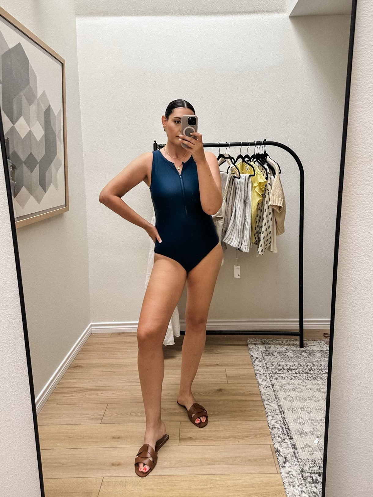 Here is the other swimsuit I tried out! Also love this one. The color is more of a true navy than shown here. There is a zupper at the chest which makes me feel like a Bond girl. This fits IDENTICAL to my Andie swimsuit that I have like this. I am in the large and this fits me perfectly, not too tight or loose. I’d say this one runs slightly smaller if you have boobs and need length. 

I'm in the large of the linen top! fit is TTS, I sized up for a looser fit. 

 #LTKSeasonal #LTKOver40 #LTKFindsUnder100
