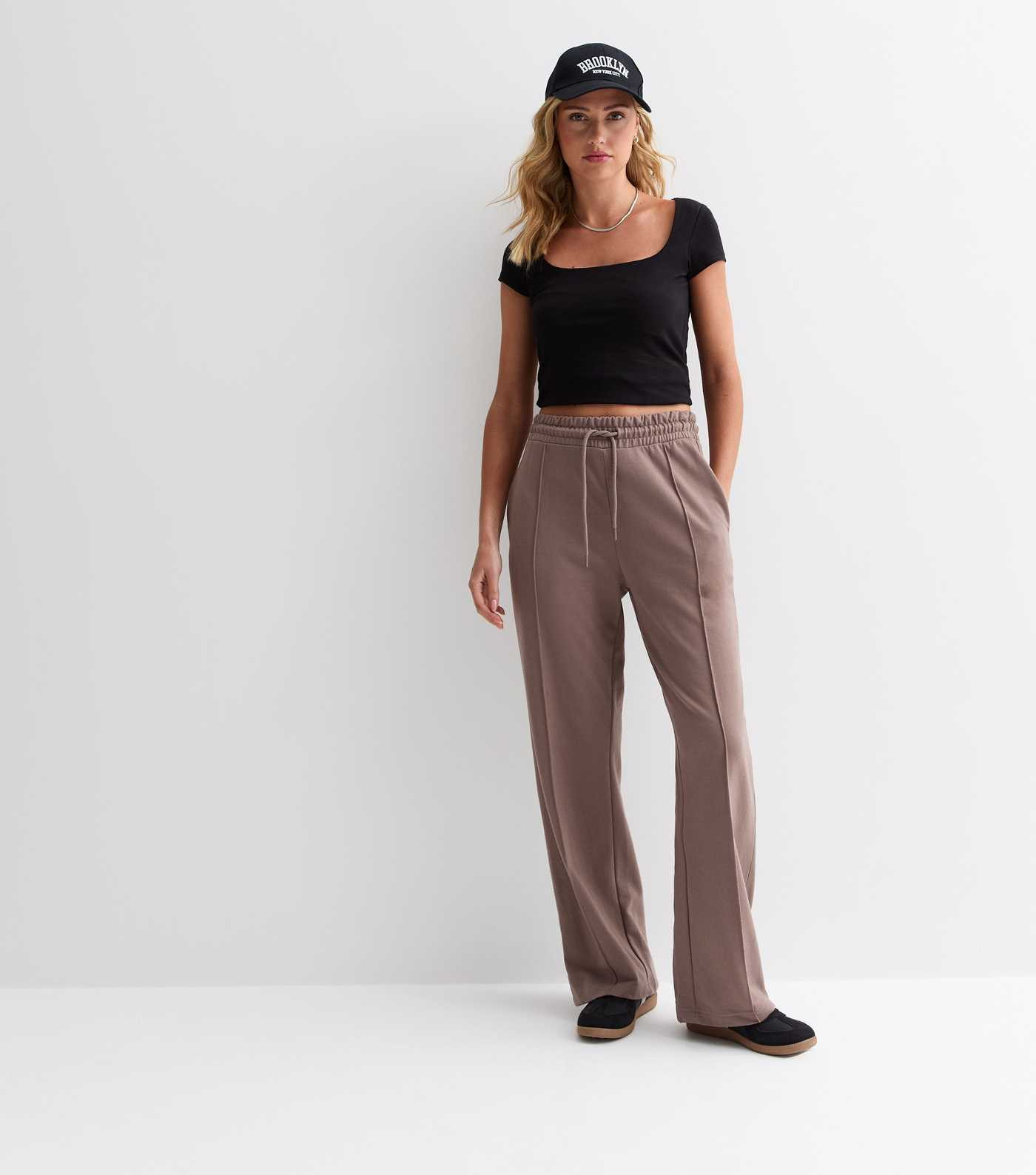 Light Brown Pin-Tuck Wide Leg Joggers 
						
						Add to Saved Items
						Remove from Saved It... | New Look (UK)