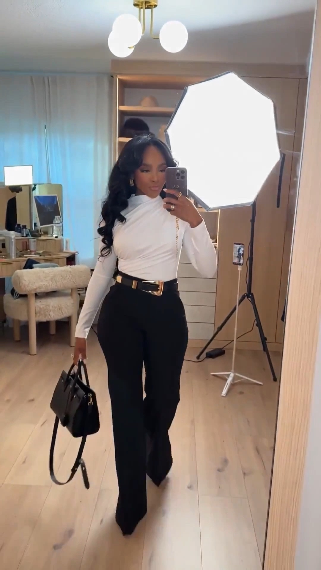 Effortless polish with a modern edge. A clean, structured top paired with tailored black pants creates that timeless, elevated look that works every time. Simple, confident, and easy to rewear — this is one of those outfits that earns its place in your wardrobe on repeat, making the cost per wear a win.

Perfect for:
• Dinner plans
• Work events
• Date nights
• Elevated everyday wear

📏 Sizing:
Top: Small  
Pants: Small  
Shoes: True to size  

Measurements:
5’4” · 138 lbs · 34D · 27” waist · 40” hips

This look is easy to style multiple ways — add a blazer, swap shoes, or layer accessories to keep the cost per wear dropping with every outfit remix.

Classic outfit inspiration, elevated neutral outfits, polished everyday style, tailored pants outfits, chic minimal fashion.

Follow me on Instagram and YouTube @kirasfashionfinds

#LTKgrwm #LTKootd