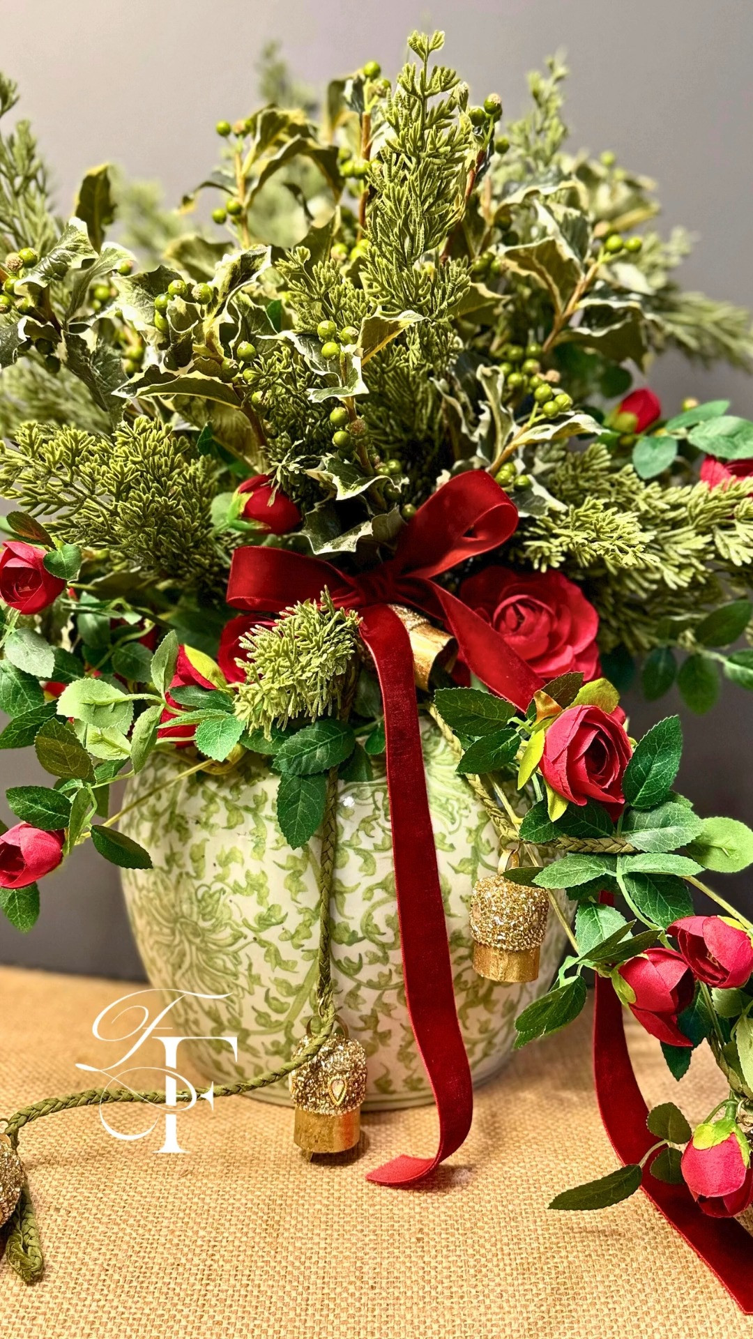 Christmas faux flower arrangement

Gorgeous faux green berry holly, fir branches, and vine red roses. Jingle sparkle bells and red velvet ribbon in a chinoiserie vase make a perfect Christmas decor idea.🎄 

 #ltkchristmasdecor #ltkchristmasflowers #ltkartificialflowers #LTKHoliday #LTKSeasonal #LTKHome