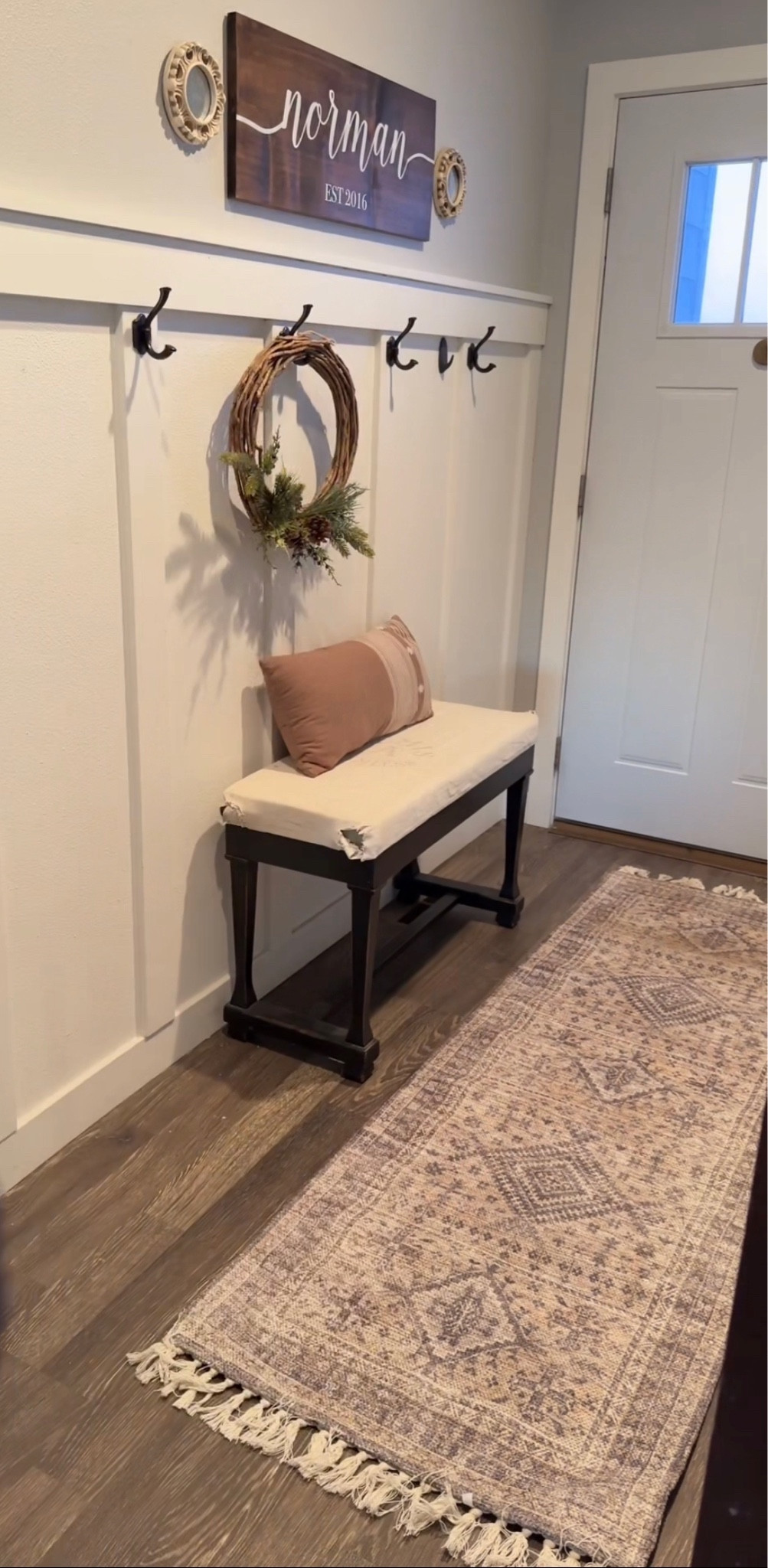 Quick and simple refresh of the entryway. New rug, old pillow and wreath.

#LTKhome #LTKstyletip