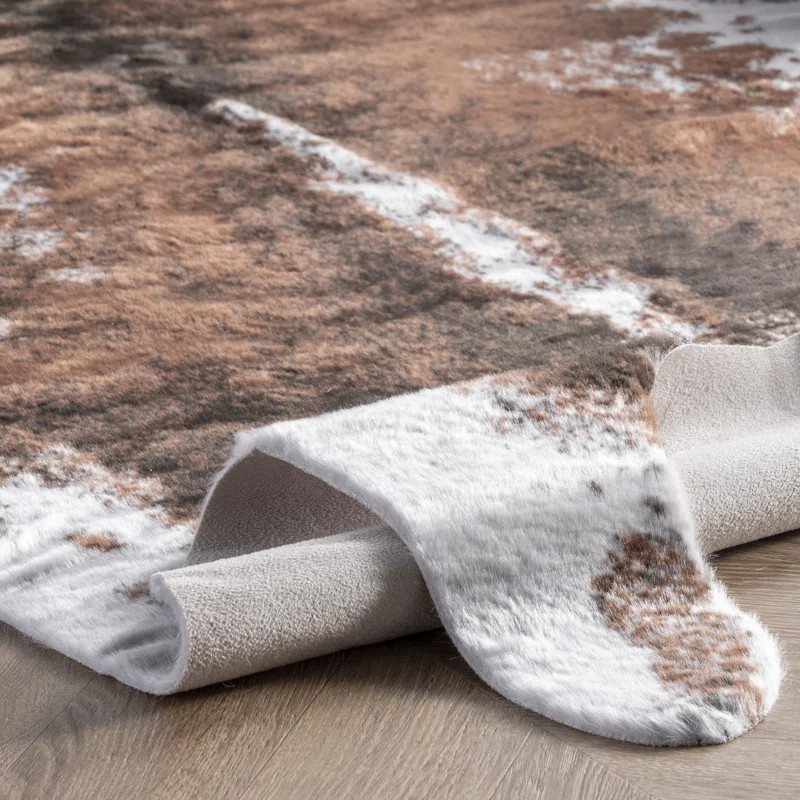 Ingeline Faux Cowhide Animal Print Rug | Wayfair North America