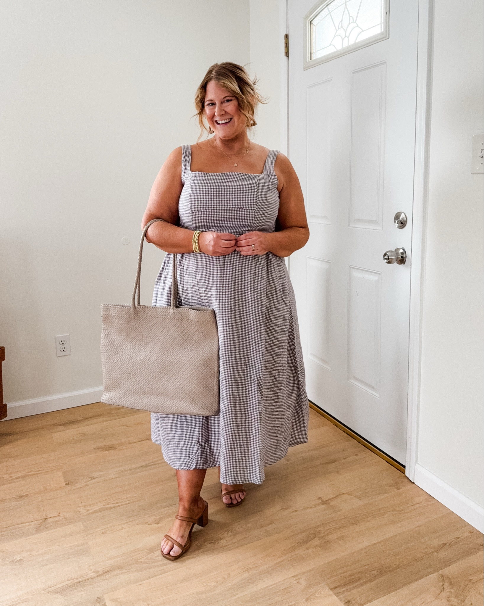Wearing a large in my linen dress from Quince! Love the gingham print but it comes in a bunch of others.  Petite and bump friendly!  Wearing an XL in my cardigan but think I prefer the large.  My bag is woven leather and gorgeous!!

#LTKWorkwear #LTKBump #LTKMidsize