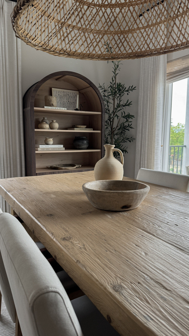 A close-up of my dining room styled with warm, earthy textures and organic modern pieces. The natural wood dining table pairs beautifully with neutral upholstered chairs, while the oversized ceramic jug and bowl bring in handcrafted, vintage-inspired charm. These Amazon finds blend timeless design with approachable price points—perfect for styling a cozy, grounded space.

Amazon home finds · organic modern dining room · earthy tabletop decor · natural wood table · neutral dining chairs · ceramic home accents · warm minimal home · cozy modern dining space · organic textures · vintage-inspired styling 

 

#LTKHome